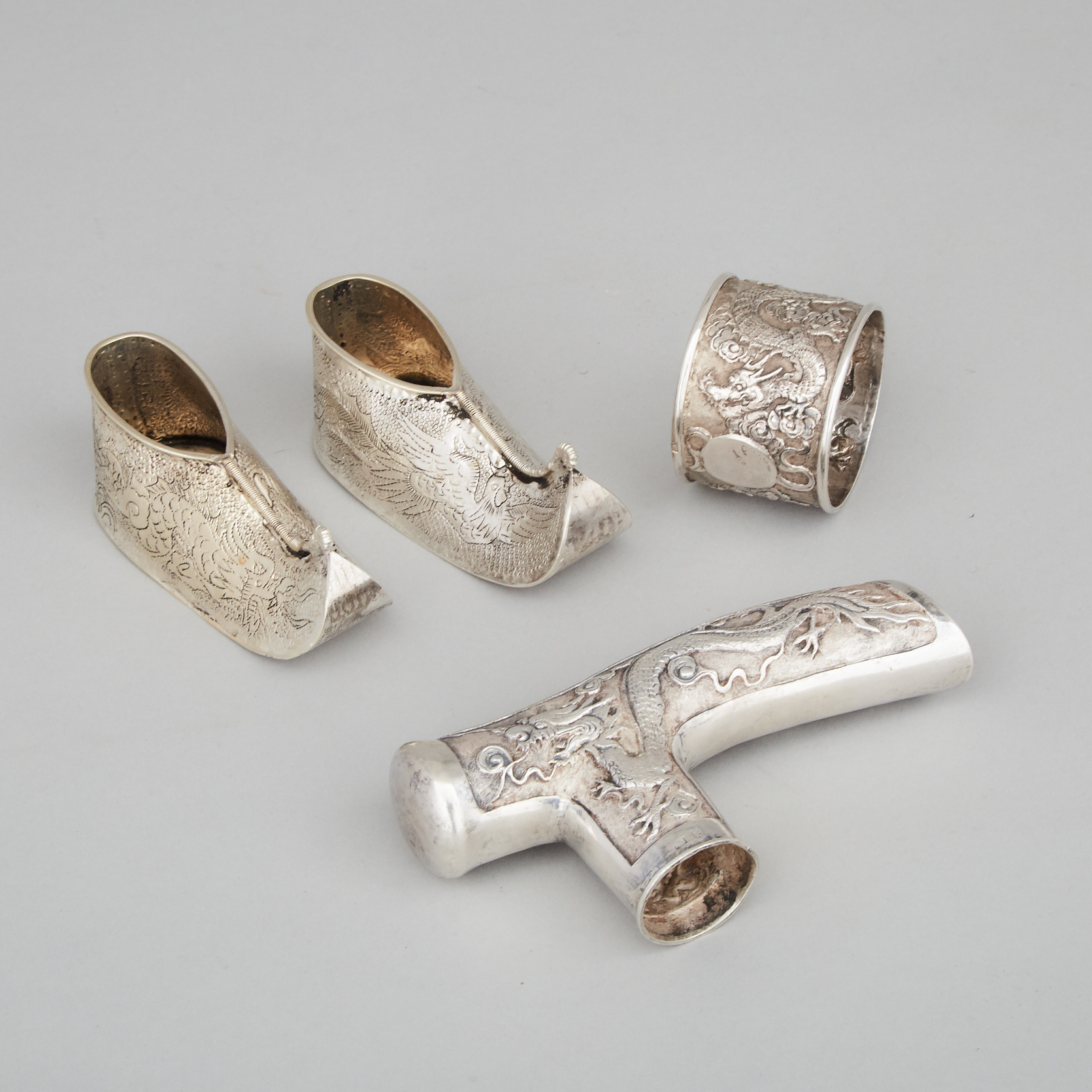 Eastern Silver Cane Handle, Napkin Ring and Two Shoes, 20th century