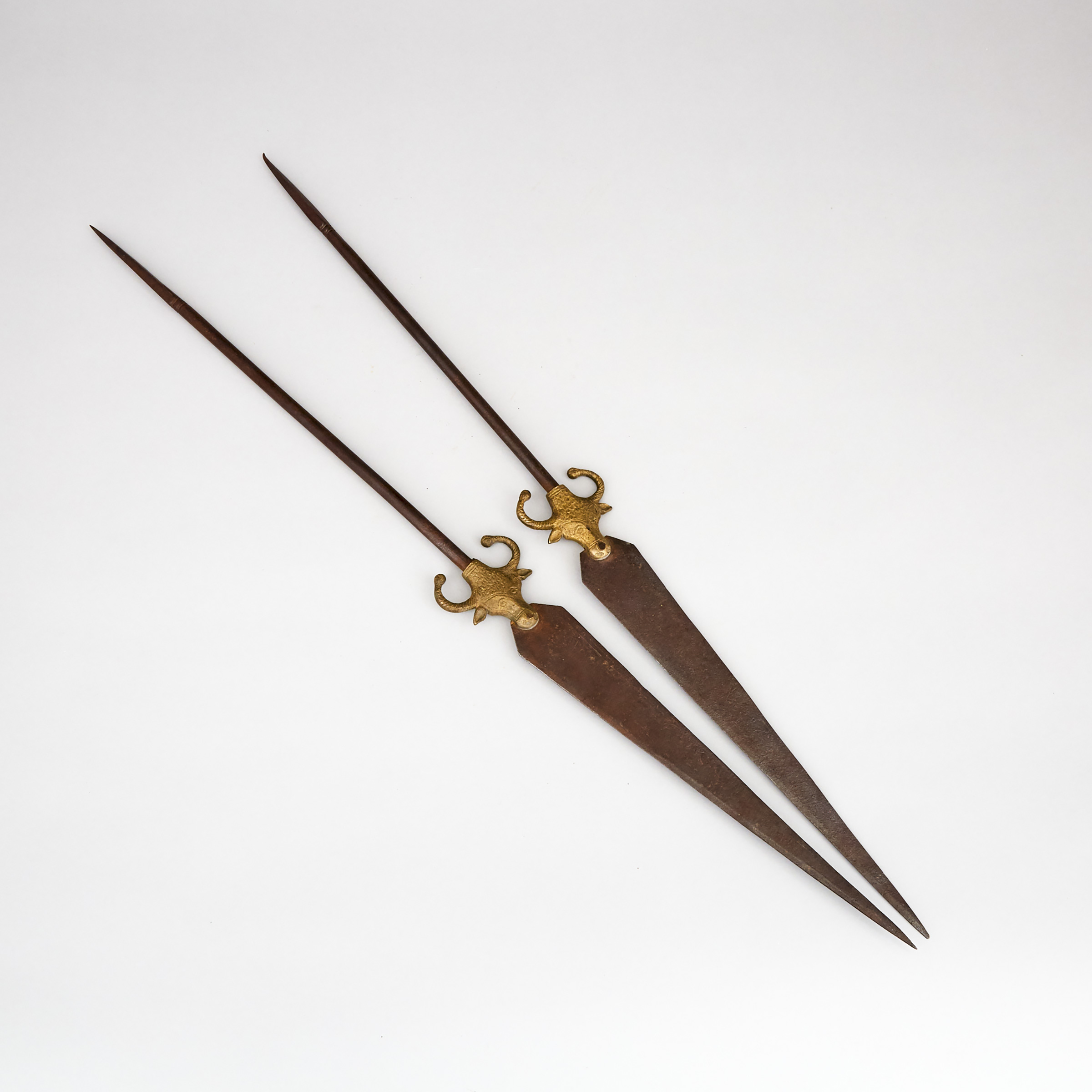 Pair of Bronze Bull Head Mounted Iron Lances/Skewers, early 20th century