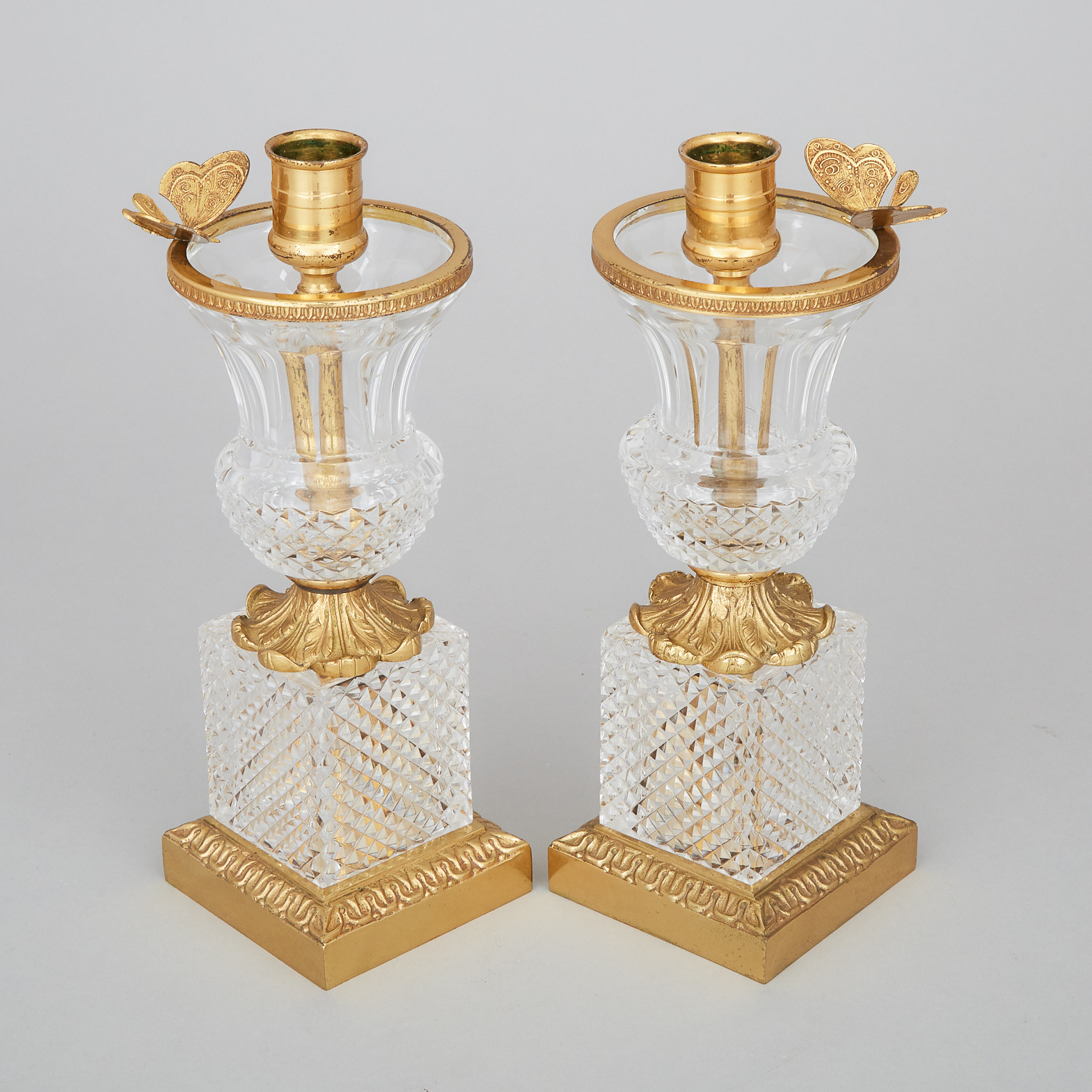 Pair of French Urn Form Ormolu Mounted Cut Glass Candlesticks, mid 20th century