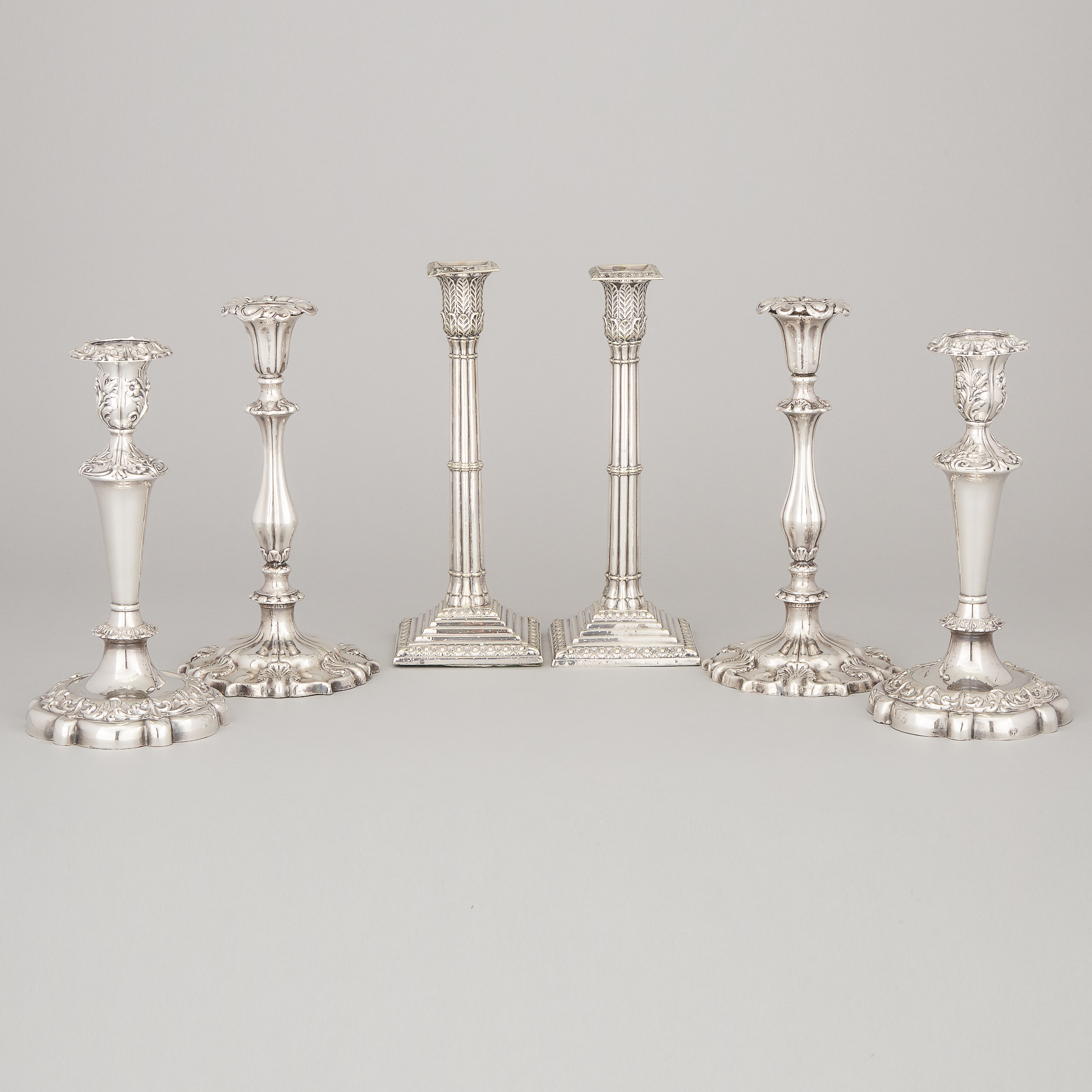 Three Pairs of Victorian and Later English Silver Plated Table Candlesticks, 19th/early 20th century