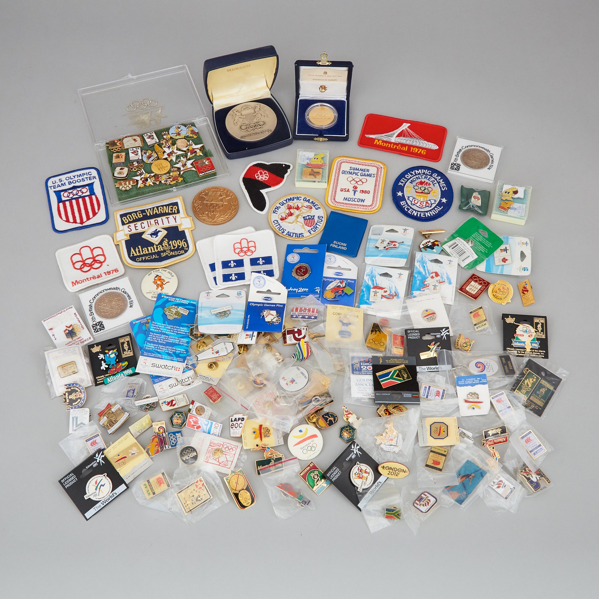 Collection of Mostly Olympic Games Related Pins, Badges and Medalliions, 1970-2010
