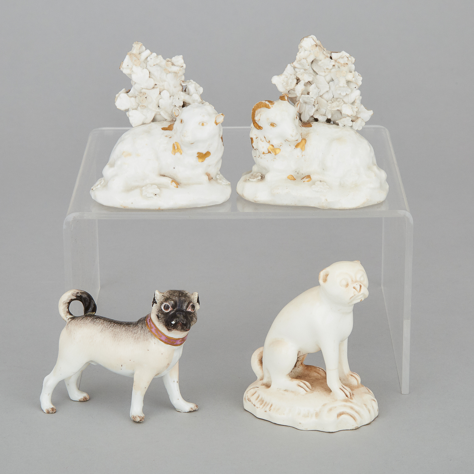 Pair of Derby Sheep, Seated Pug Dog and Another, probably Meissen, 18th/19th century