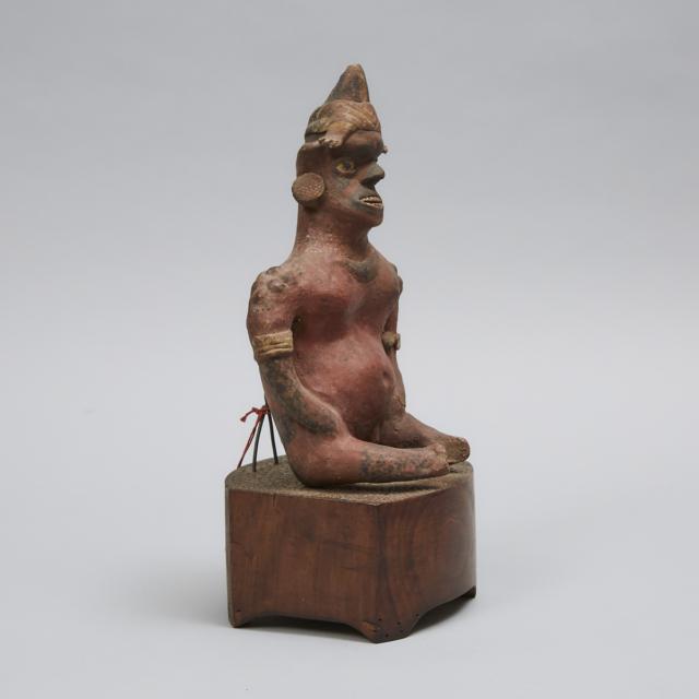 Jalisco Pottery Seated Male Figure, West Mexico, 100 B.C. - 200 A.D.