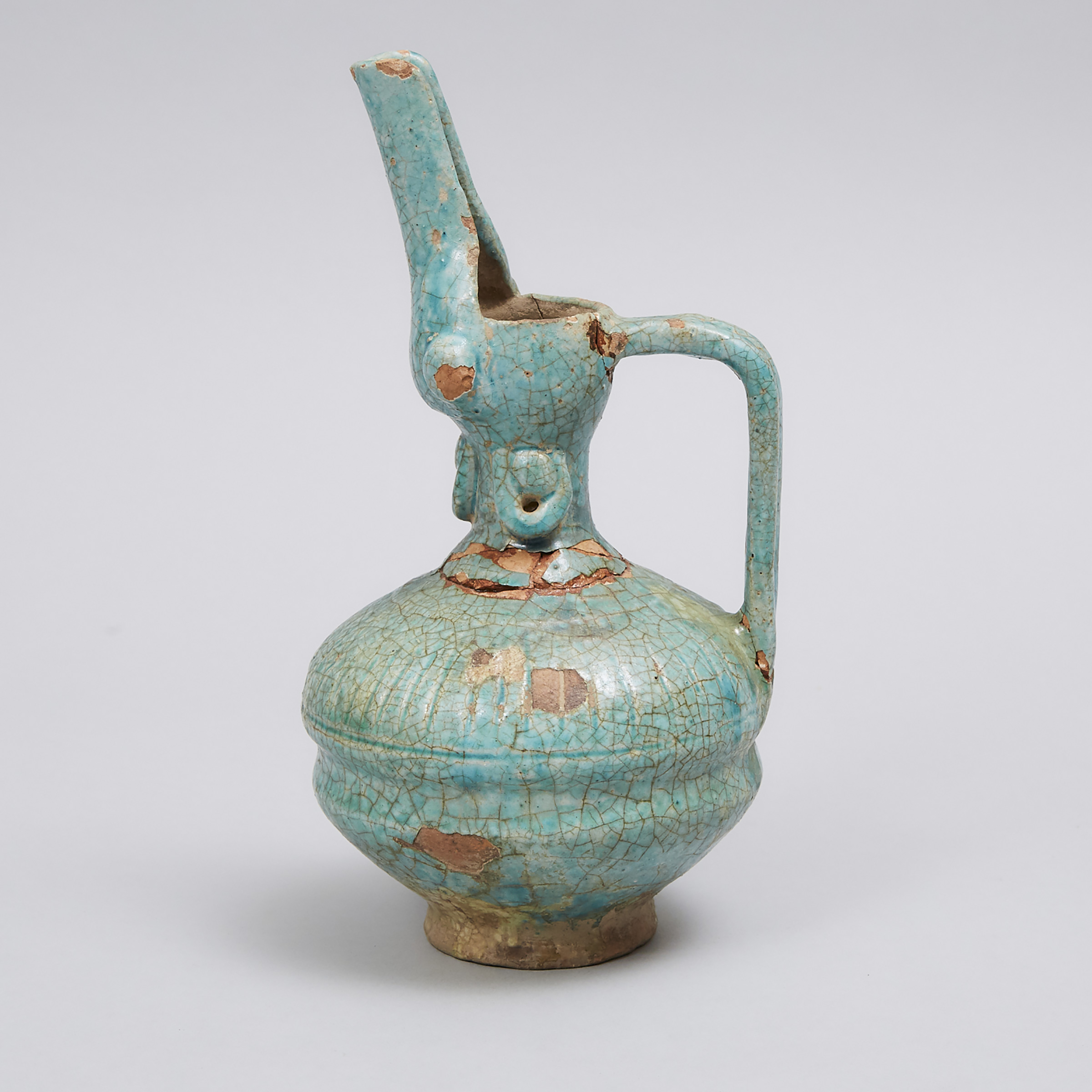 Kashan Turquoise Glazed Fritware Bird-Form Ewer, 12th/13th century