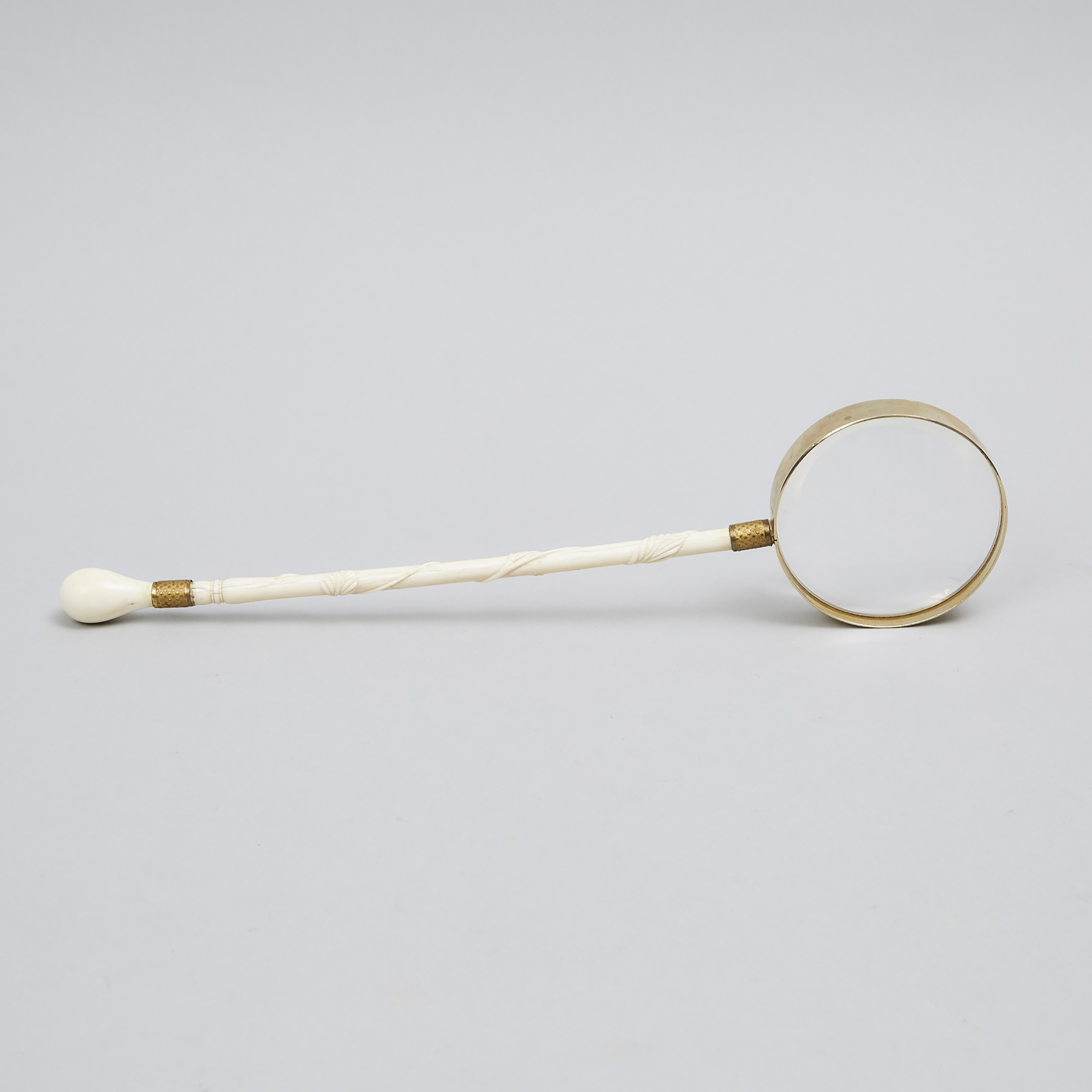 French Carved Ivory Parasol Handled Magnifying Glass, 19th century and later
