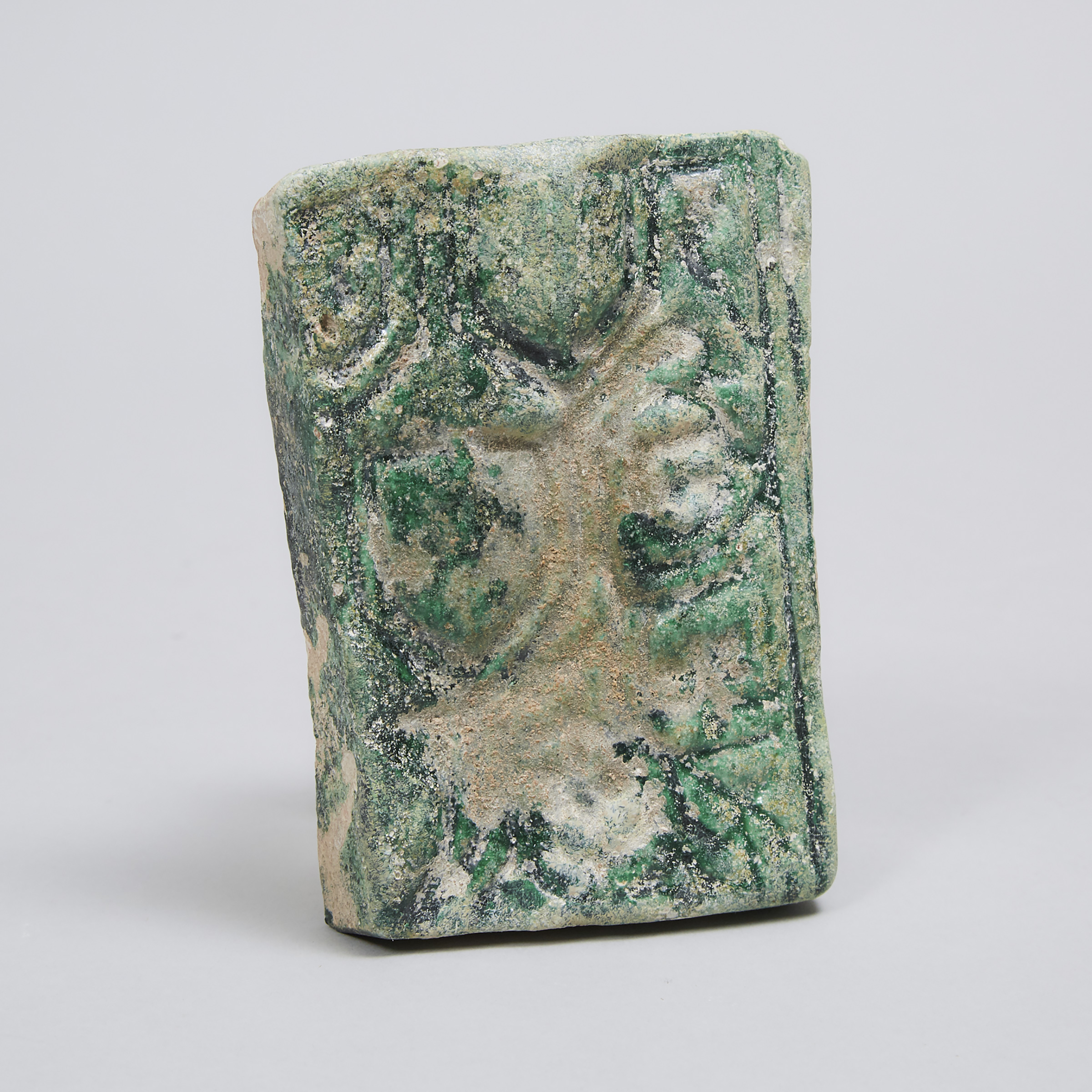Seljuk Empire Green Glazed Relief Moulded Pottery Border Tile, Persia, 12th century