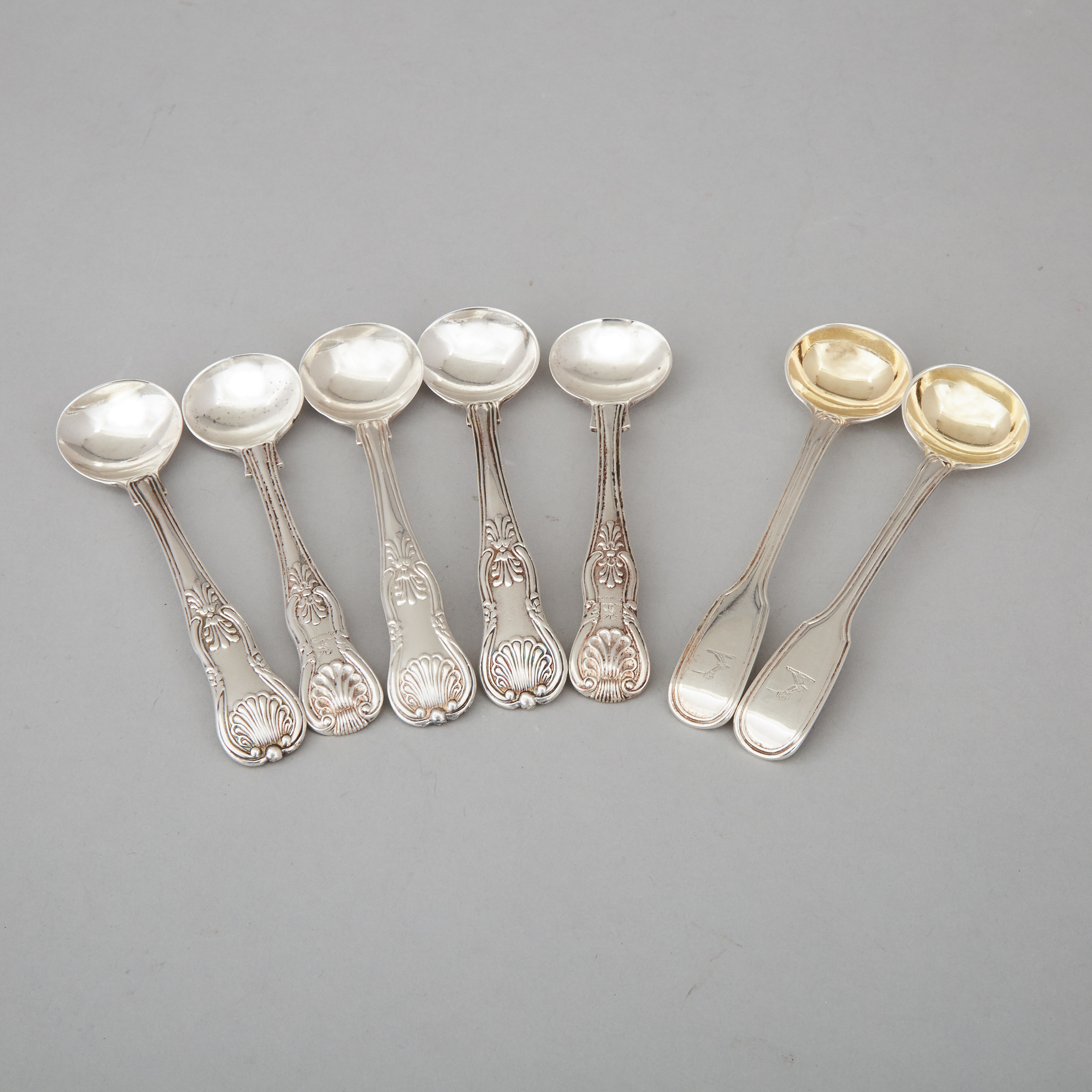 Seven Late Georgian and Victorian Silver Kings and Fiddle and Thread Pattern Salt Spoons, London and Dublin, 1827-43