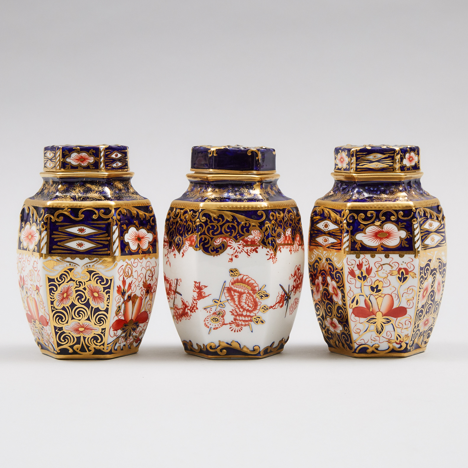Three Royal Crown Derby 'Imari' (2451) and Japan (2649) Pattern Hexagonal Tea Caddies with Covers, c.1905-16