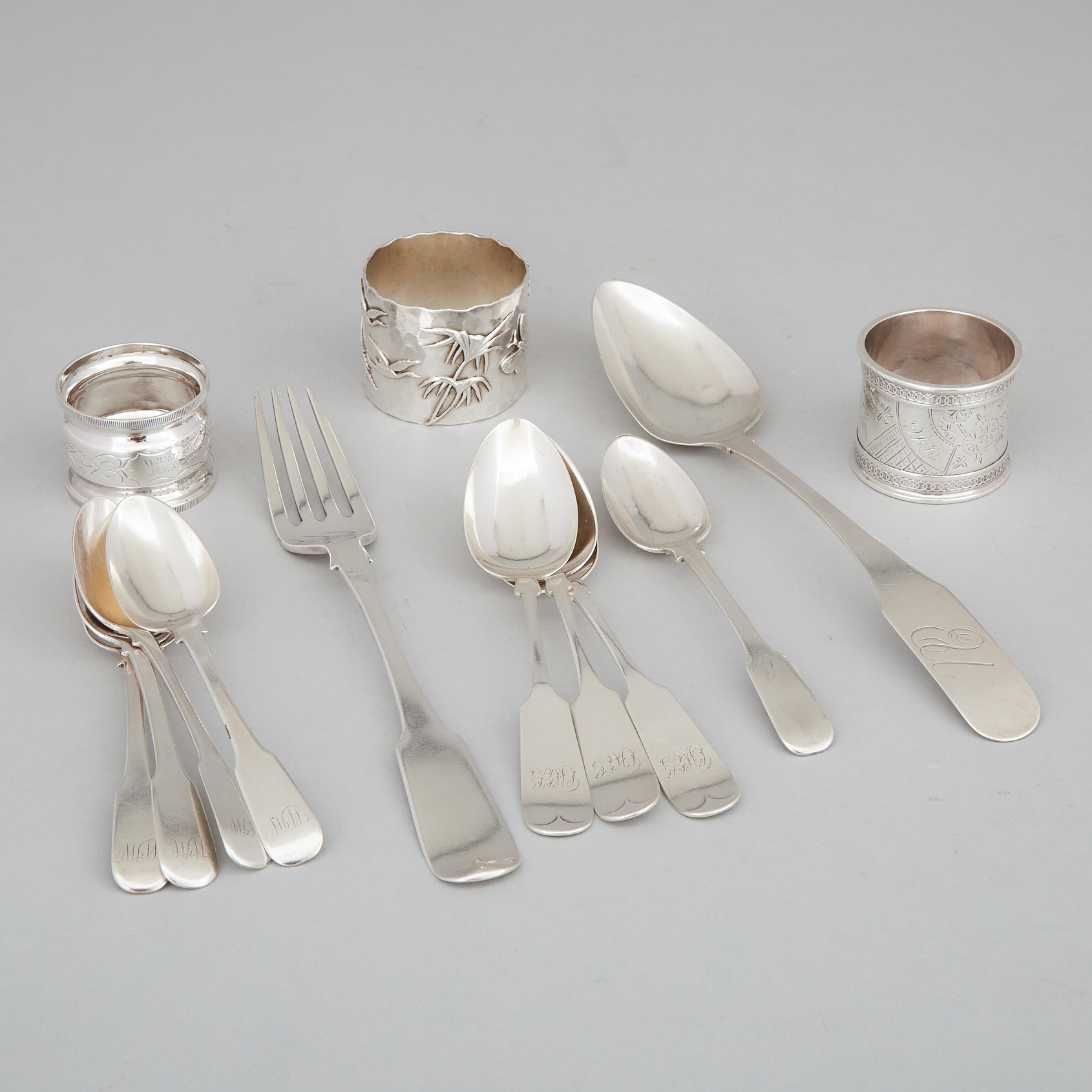 American Silver Napkin Ring, George Shiebler & Co. New York, N.Y., 1880s, together with Two Others and Ten Pieces of Fiddle Pattern Flatware, 19th century