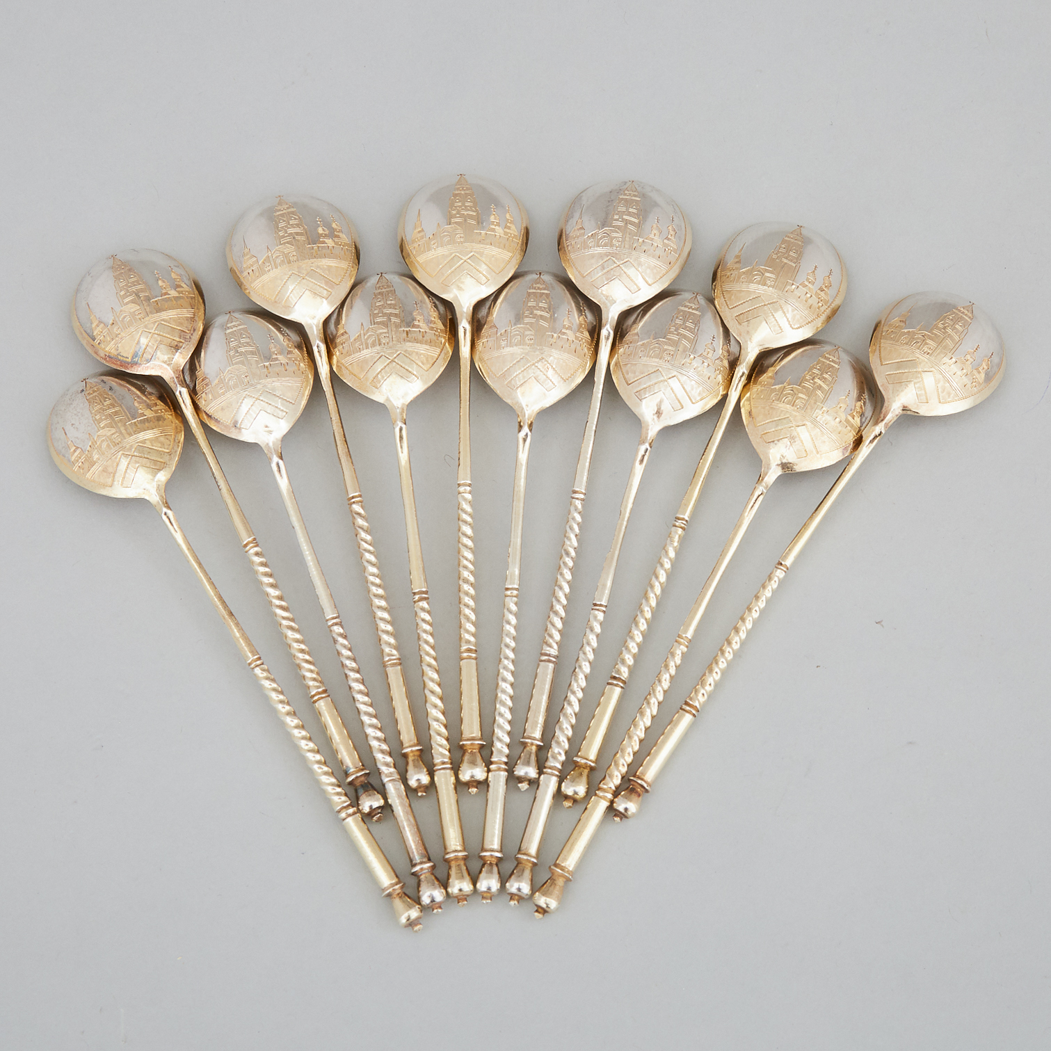Set of Twelve Russian Engraved Silver-Gilt Tea Spoons, Moscow, 1883