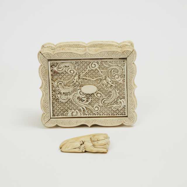 A Chinese Ivory Puzzle Ball, Jewellery Box, and Toggle, 19th/Early 20th Century