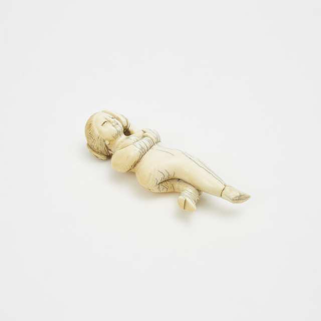 A Chinese Ivory 'Doctor's Doll' Snuff Bottle, Early 20th Century