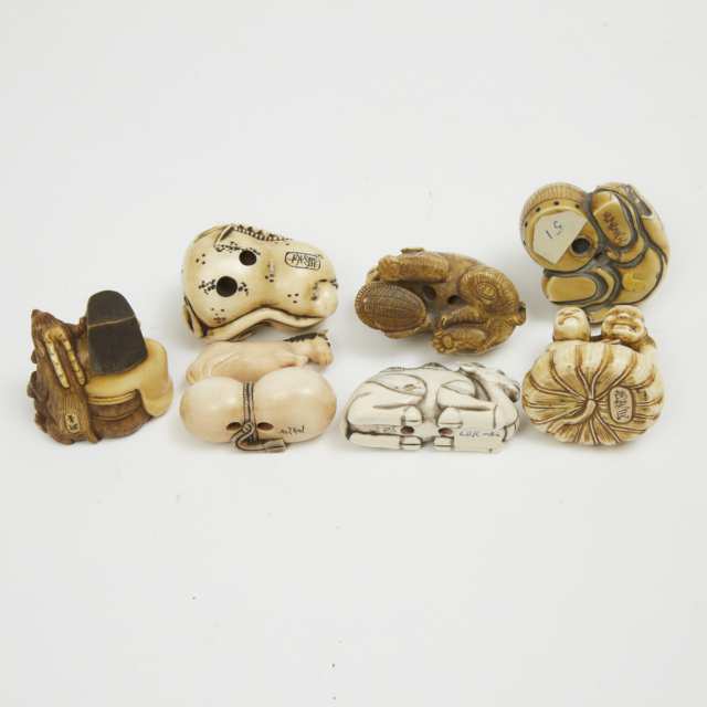 A Group of Thirty-One Ivory, Bone, Antler and Ivorine Carved Netsuke