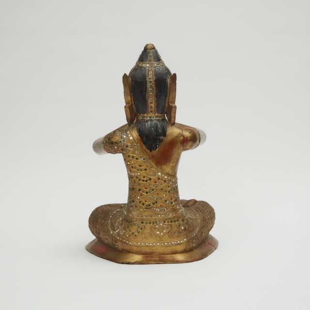 A Thai Lacquer Wood Figure of a Musician