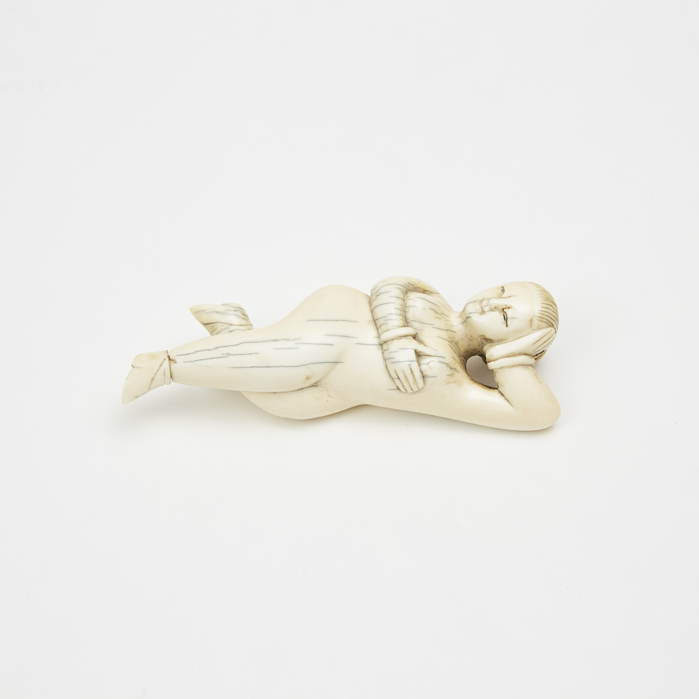 A Chinese Ivory 'Doctor's Doll' Snuff Bottle, Early 20th Century