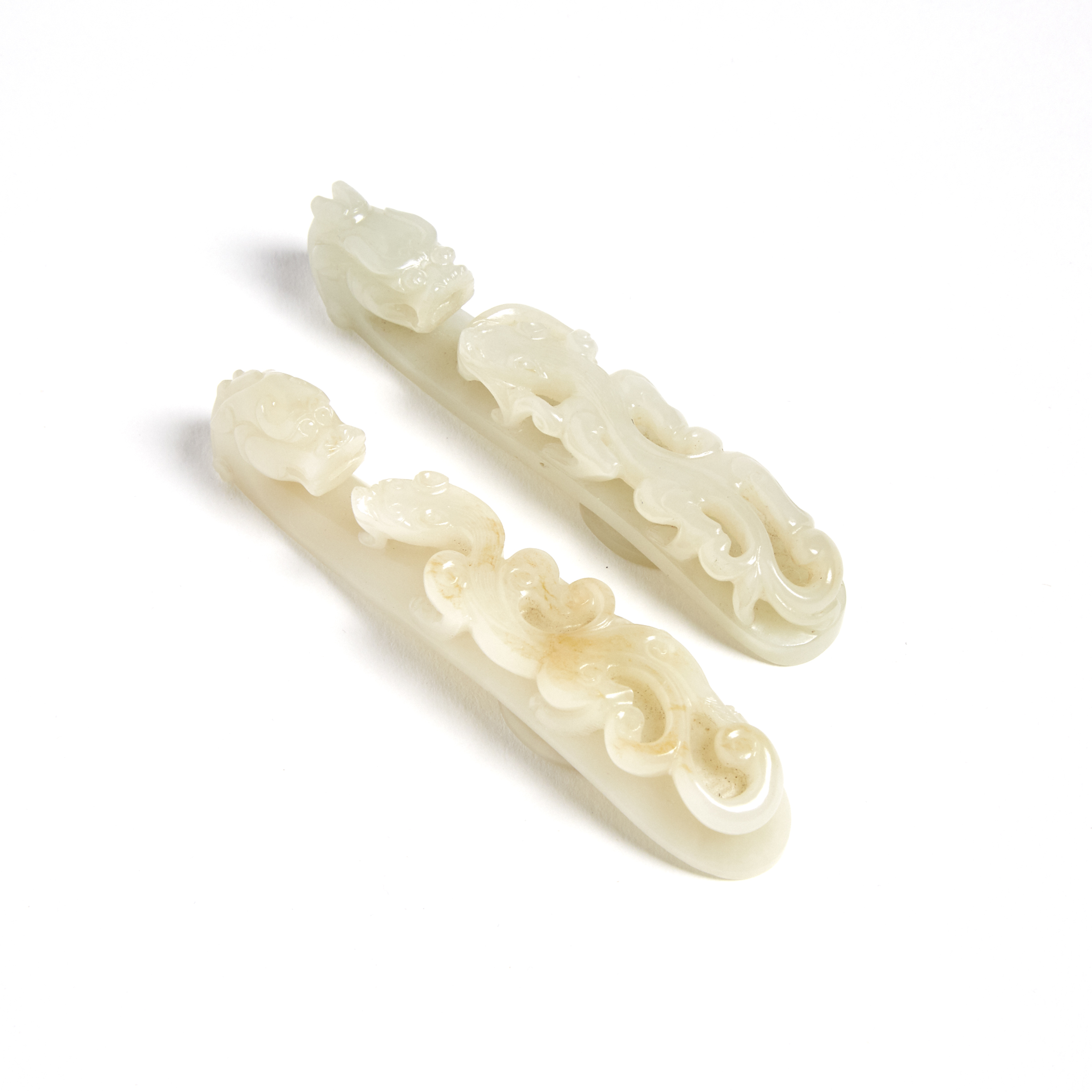 Two Celadon White Jade Chilong Belt Hooks