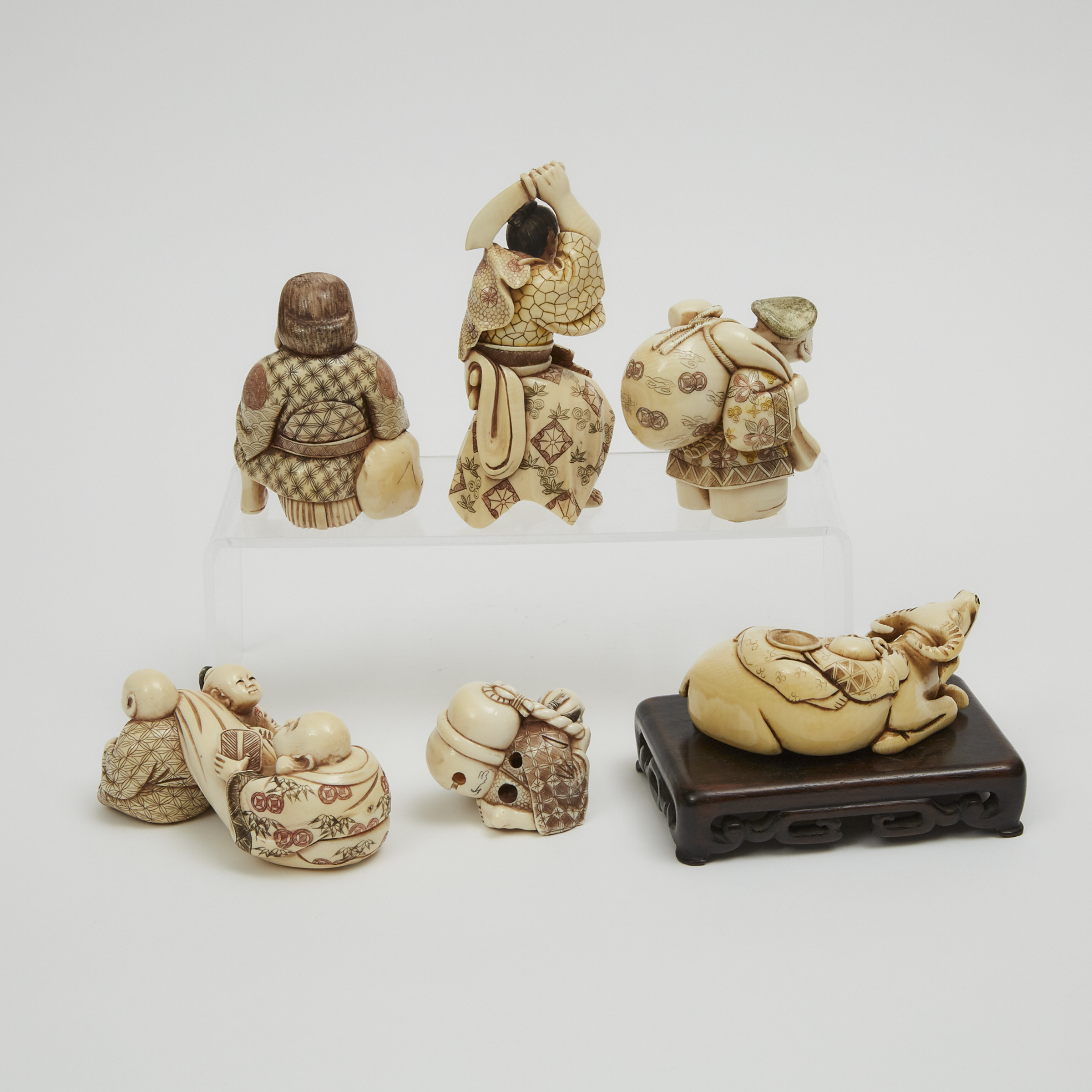 A Group of Six Japanese Ivory Carved Figures