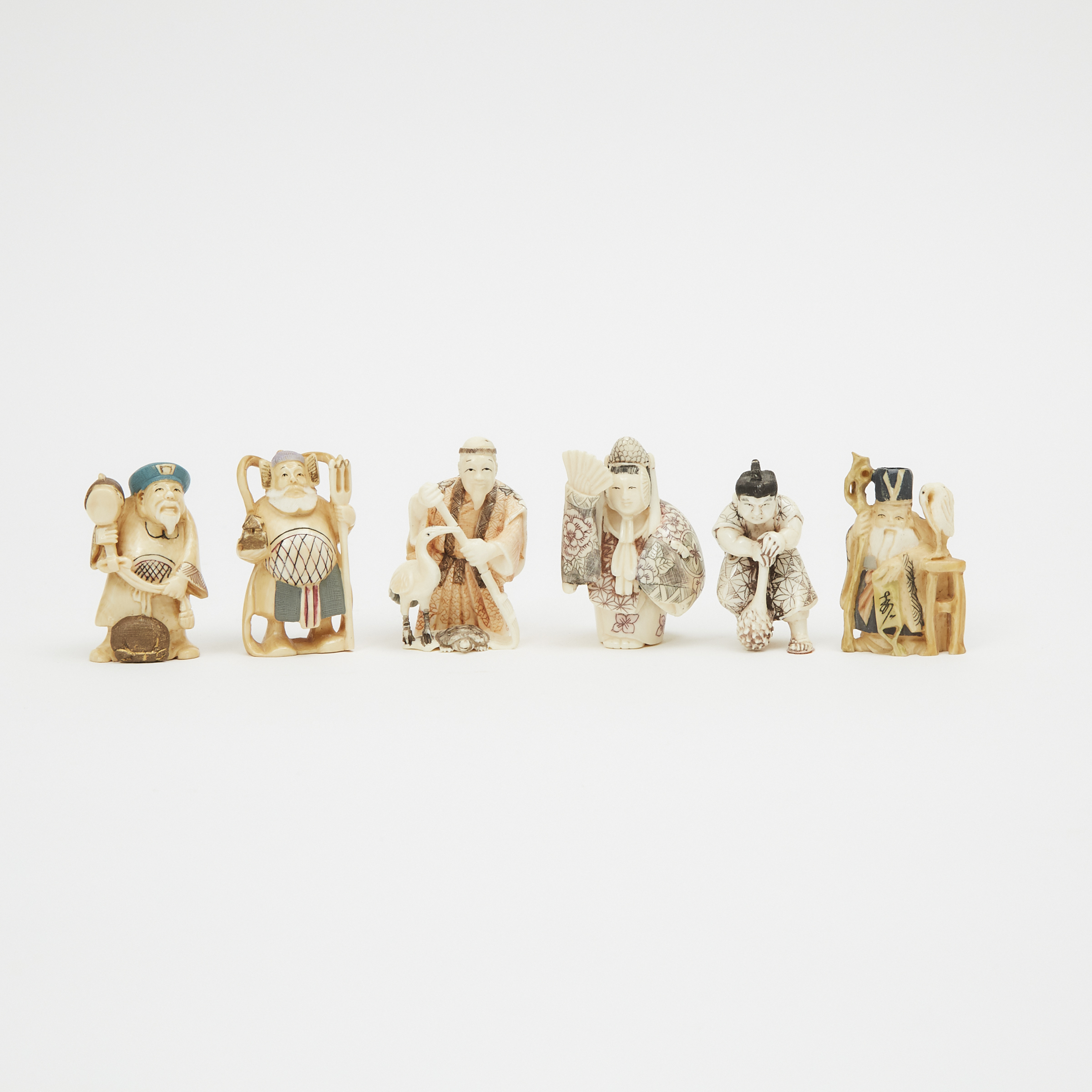 A Group of Six Ivory Carved Polychrome Figural Netsuke