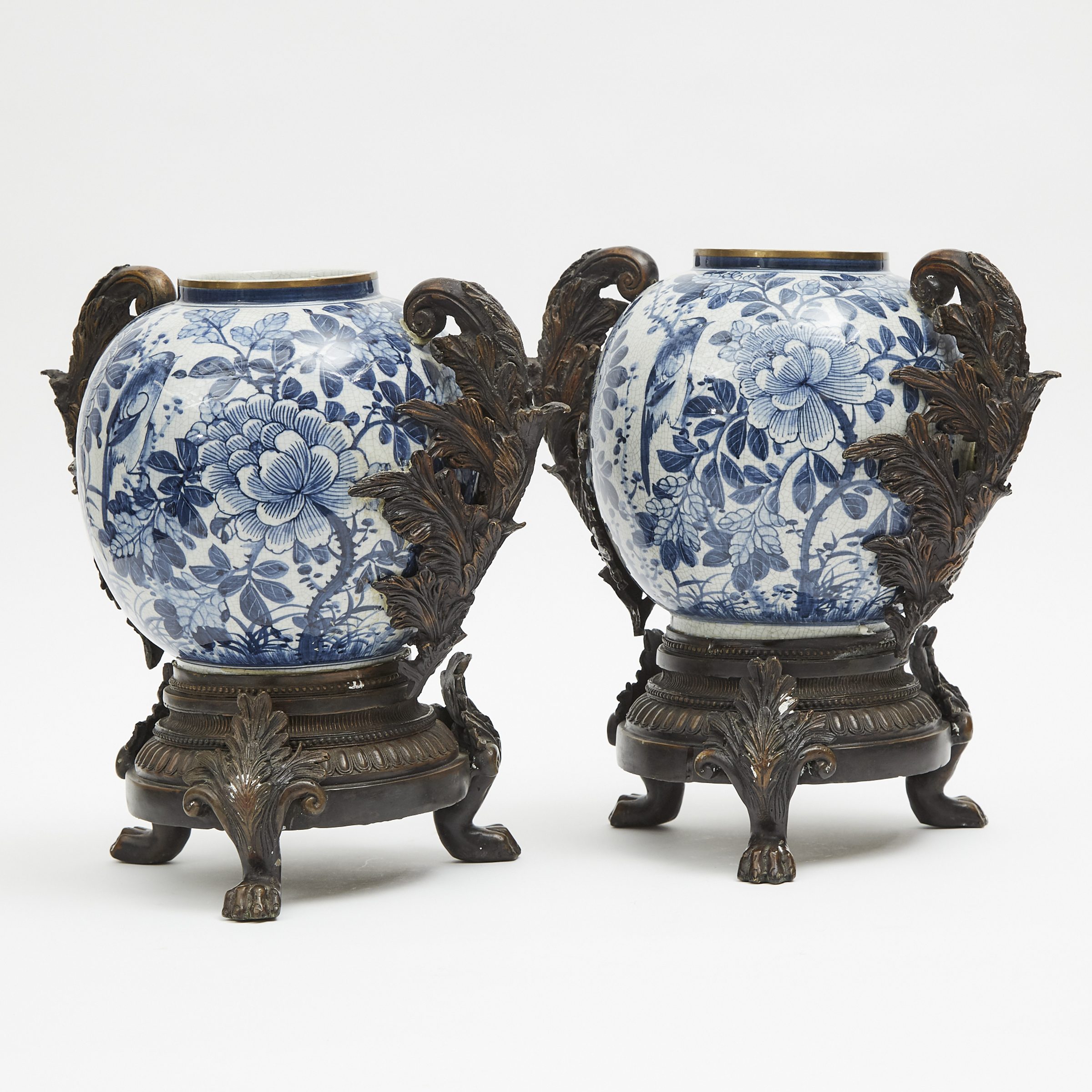 A Pair of Bronze Mounted Blue and White Vases