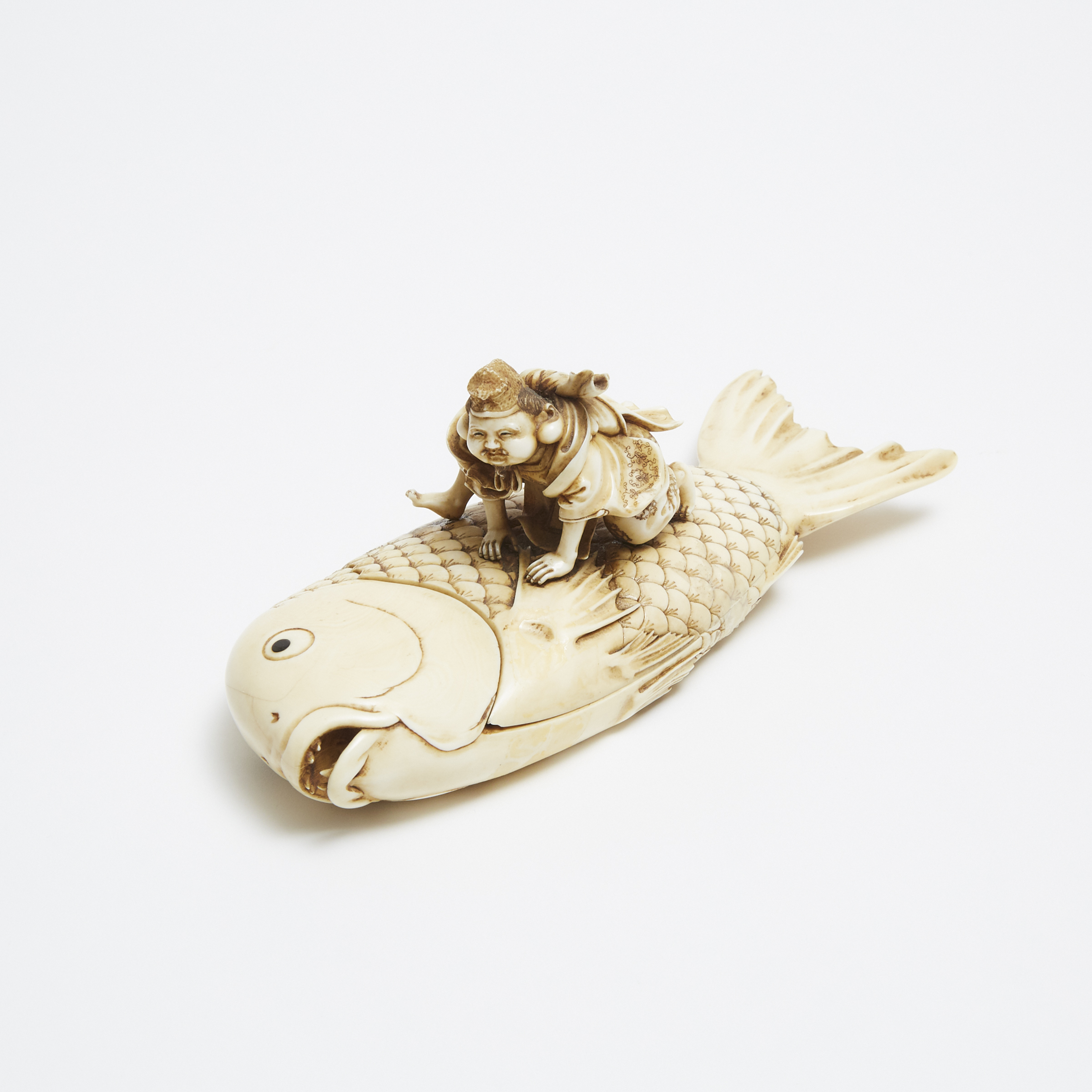 An Ivory Carved Box of Ebisu Riding a Giant Sea Bream