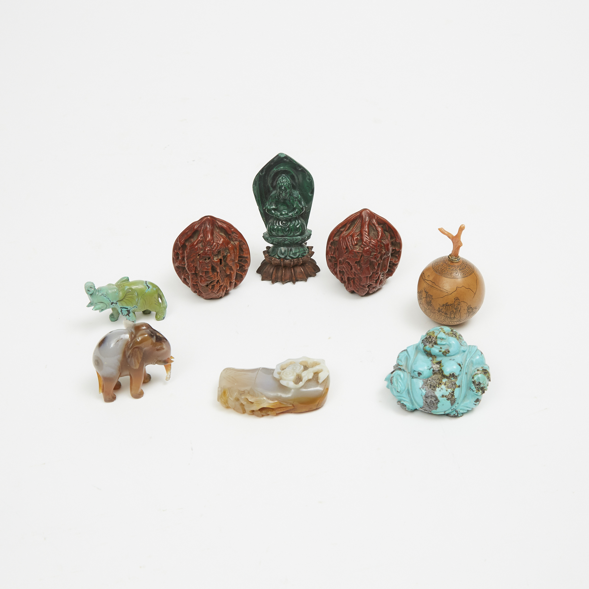 A Group of Eight Hardstone, Gourd, and Walnut Carvings