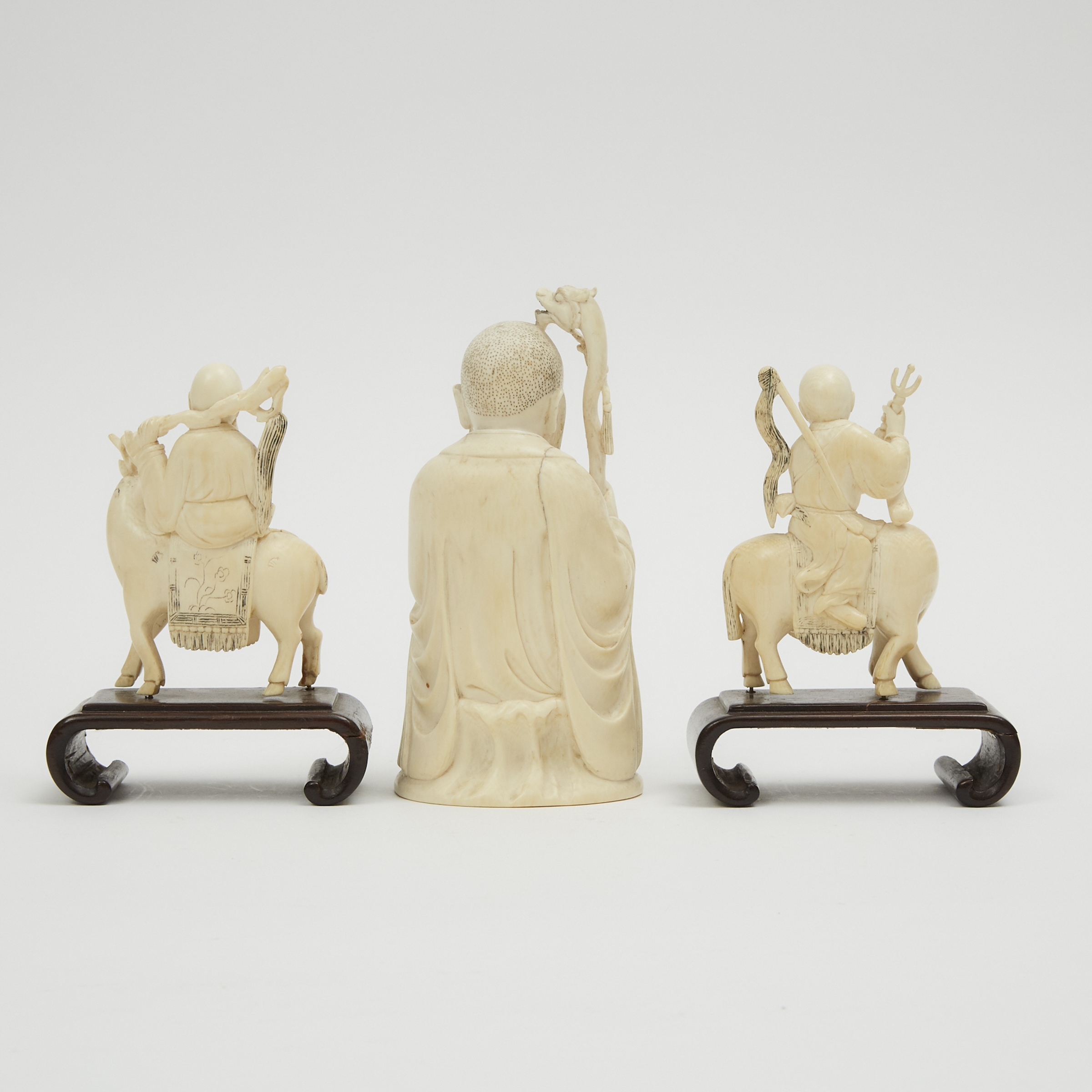 A Group of Three Chinese Ivory Carved 'Luohan' Figures, Early 20th Century
