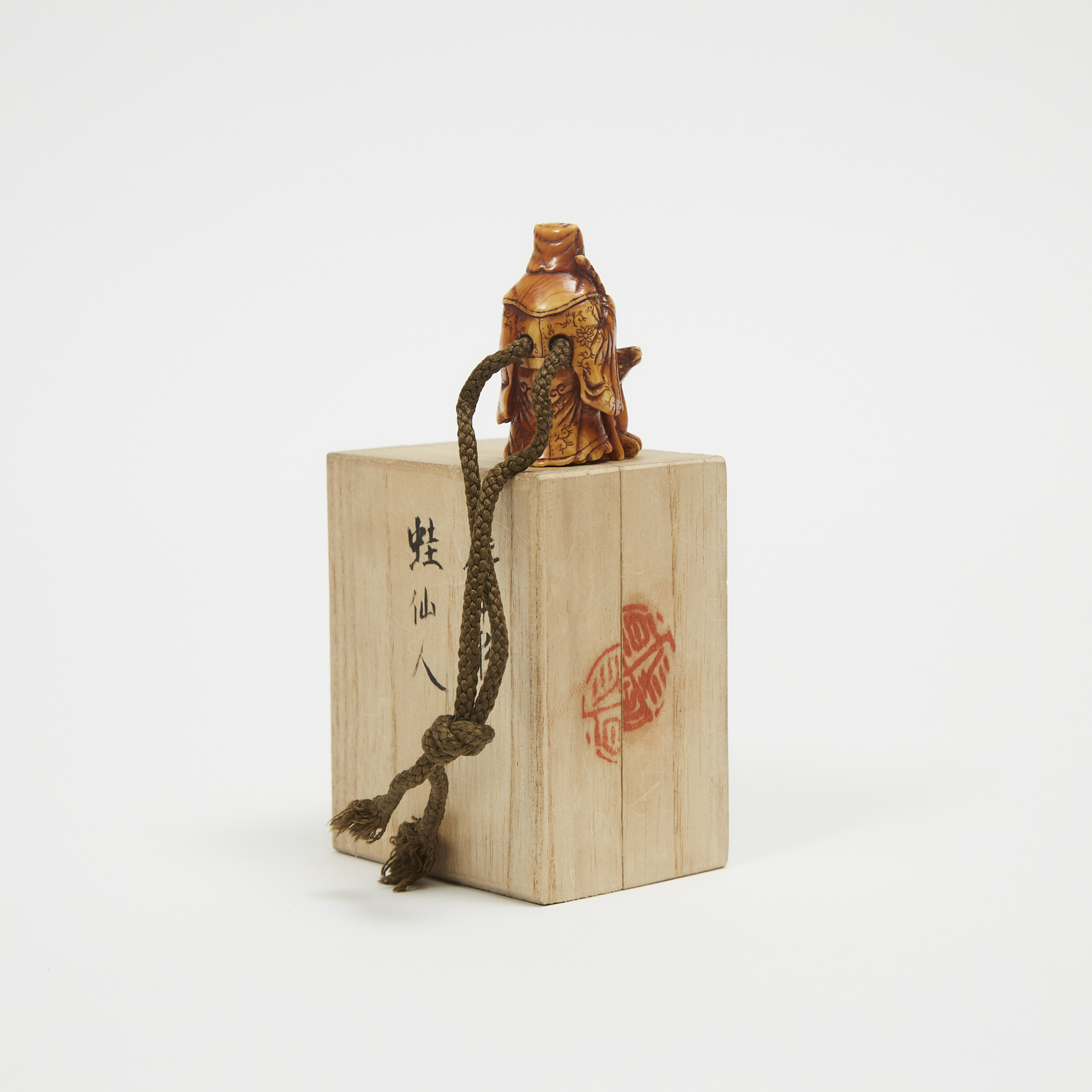 An Ivory Netsuke of an Old Man and Deer, with Signed Box