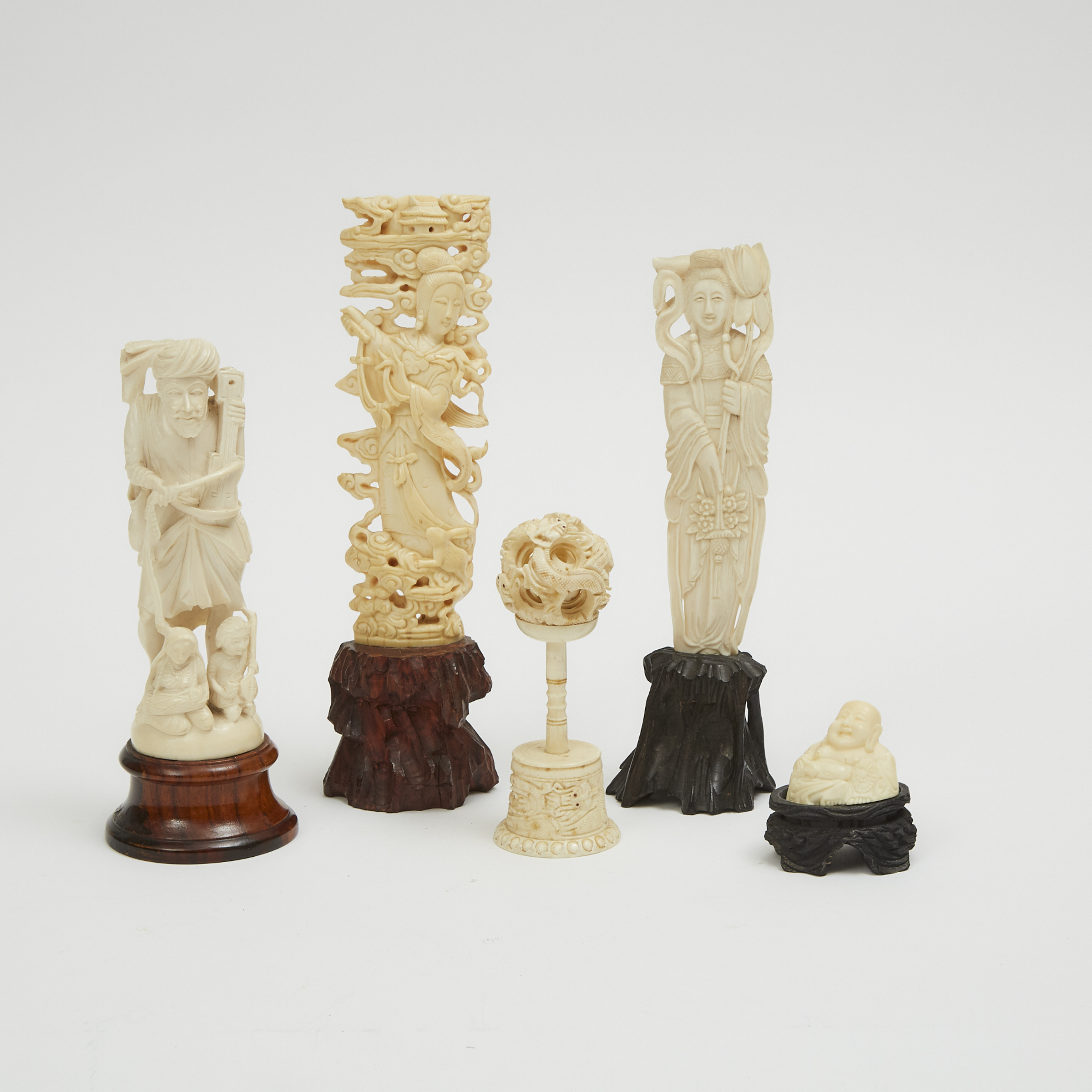 A Group of Five Ivory Carvings