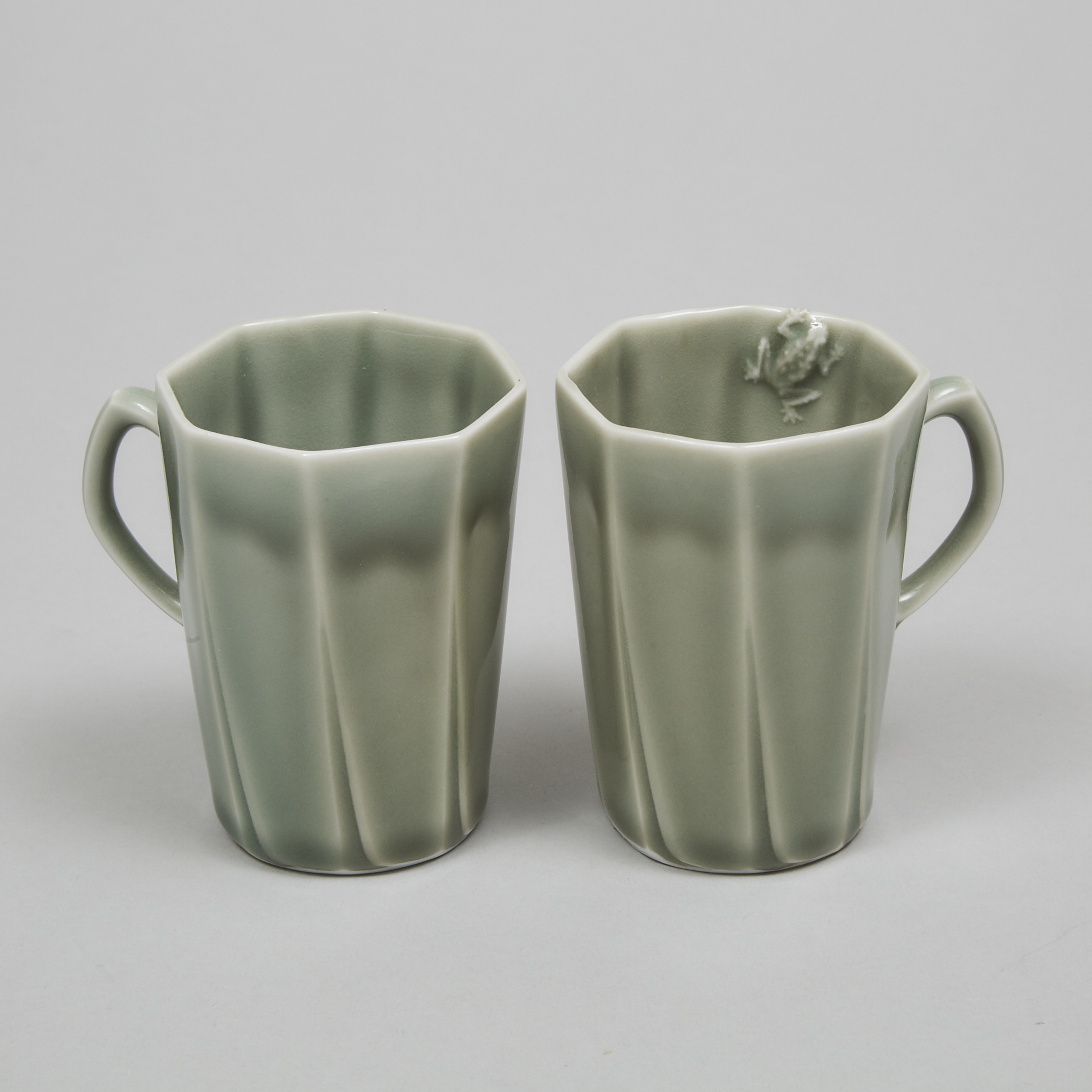 Harlan House (Canadian, b.1943), Two Celadon Glazed Octagonal 'Frog' Mugs, c.2000