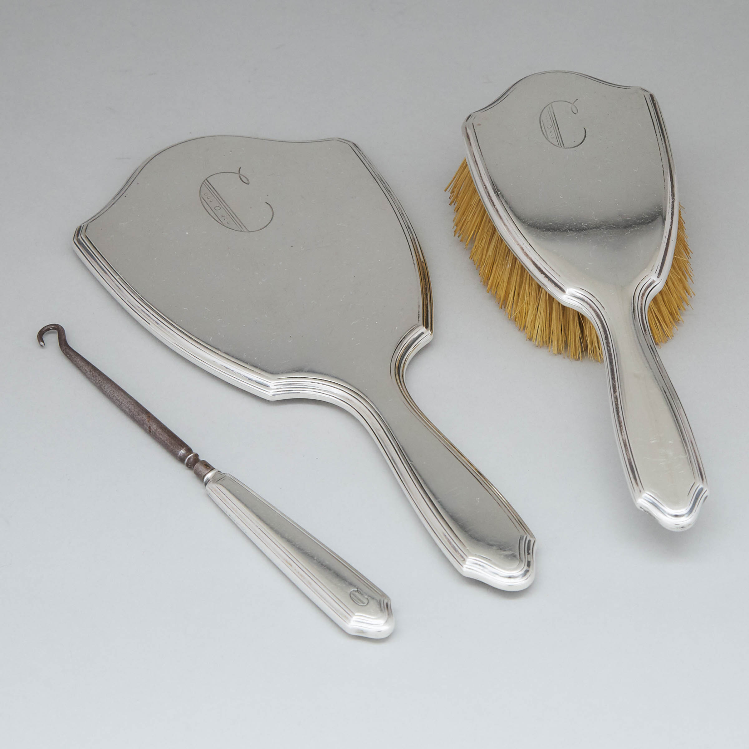 American Silver Hair Brush, Hand Mirror and a Button Hook, Tiffany & Co., New York, N.Y., c.1930