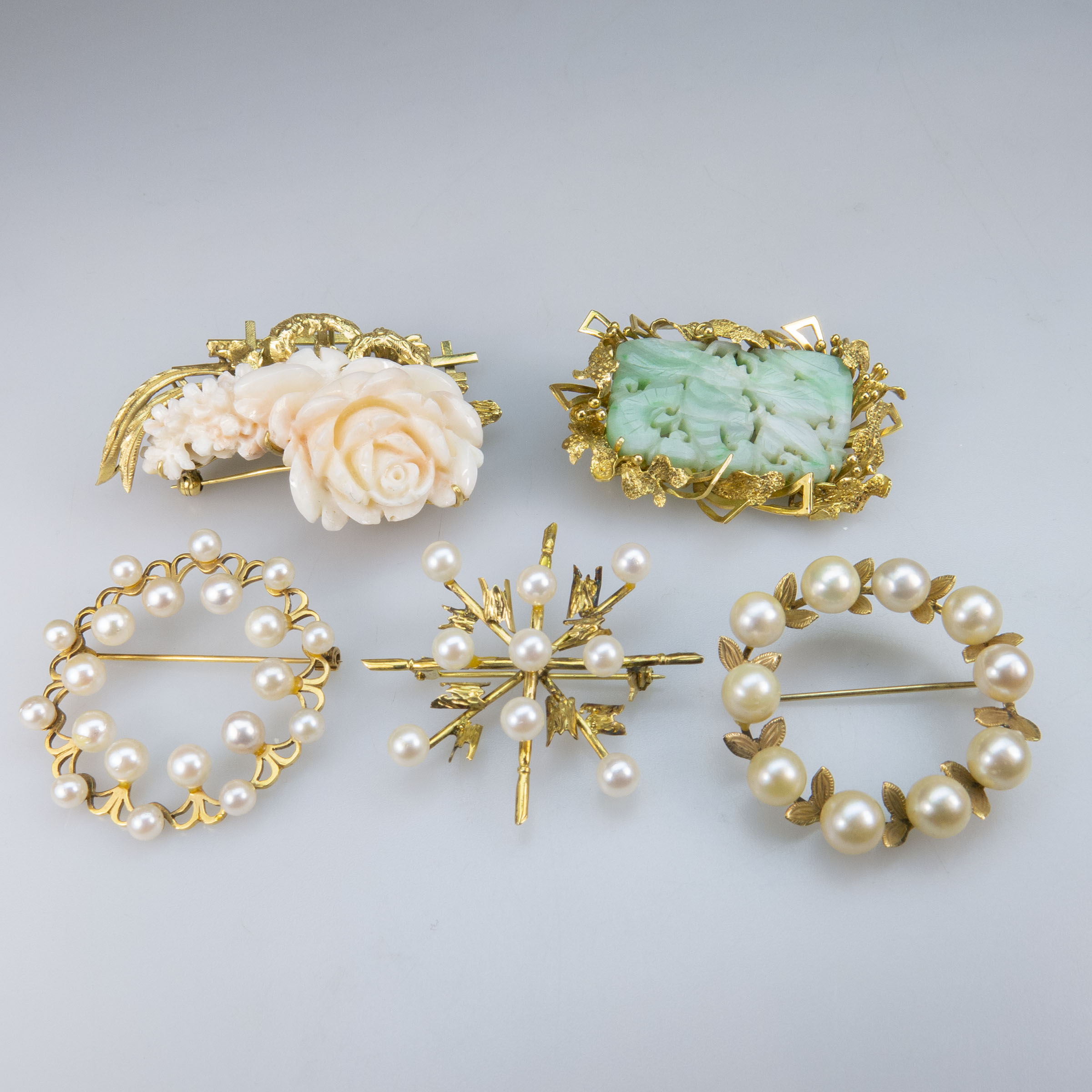 Five Gold Brooches