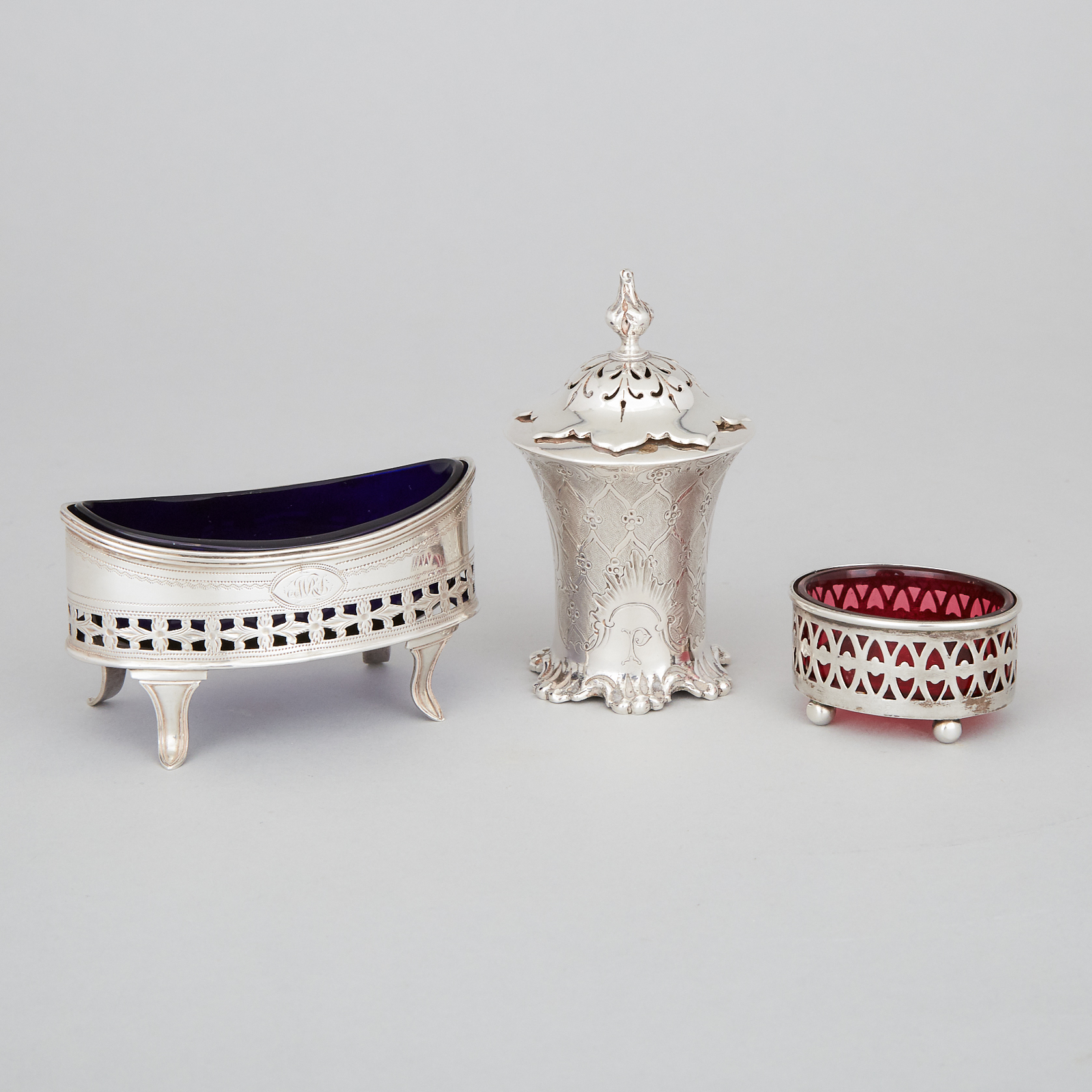 Two George III and Victorian Silver Salt Cellars and a Caster, London and Chester, 1796/1854/1896