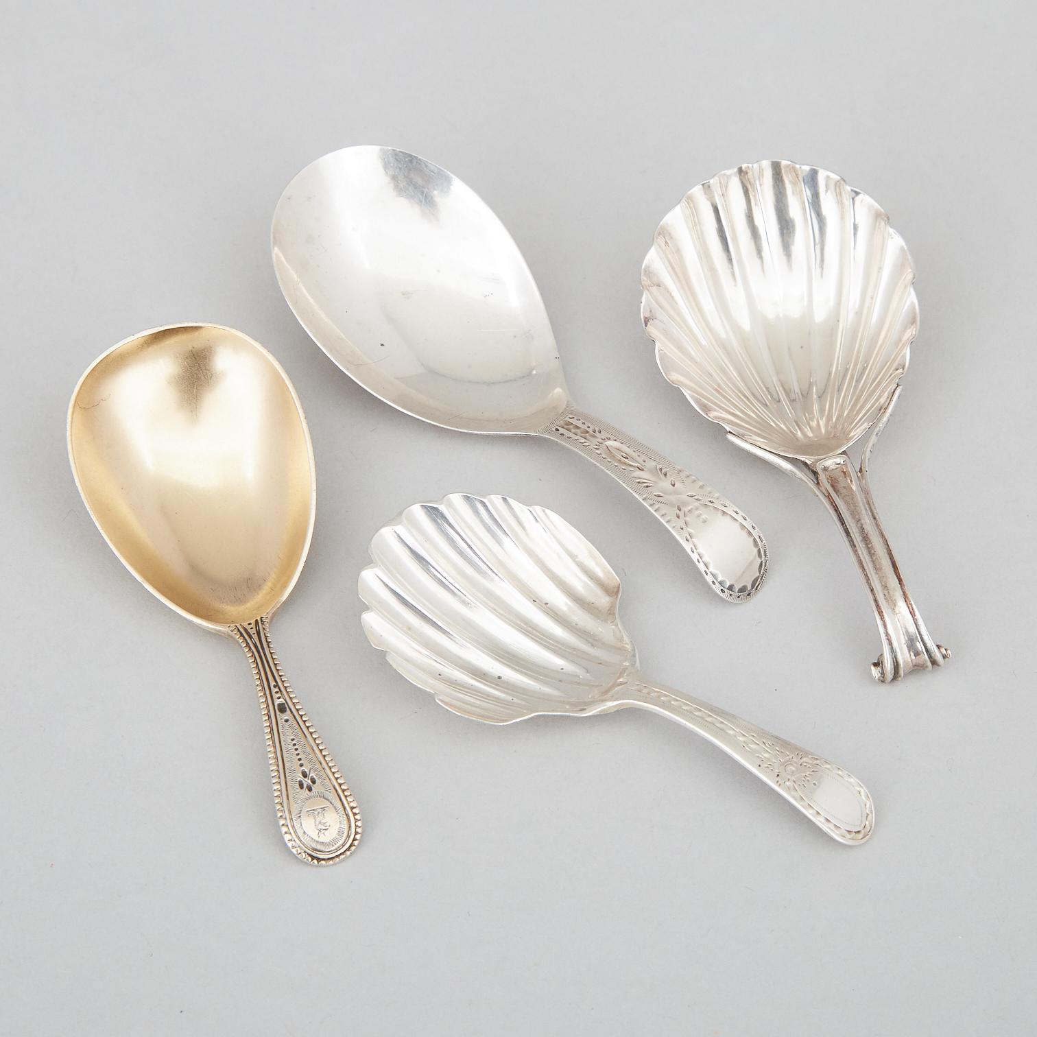 Four George III and Victorian Silver Caddy Spoons, London, 1790-1868