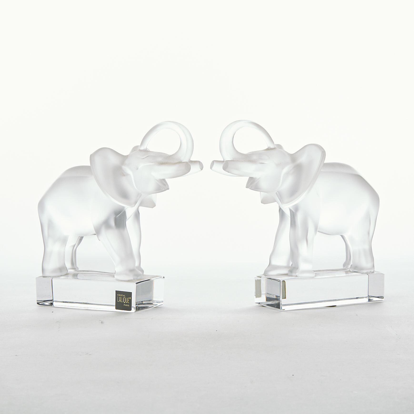 Pair of Lalique Moulded and Frosted Glass Elephant Bookends, post-1978