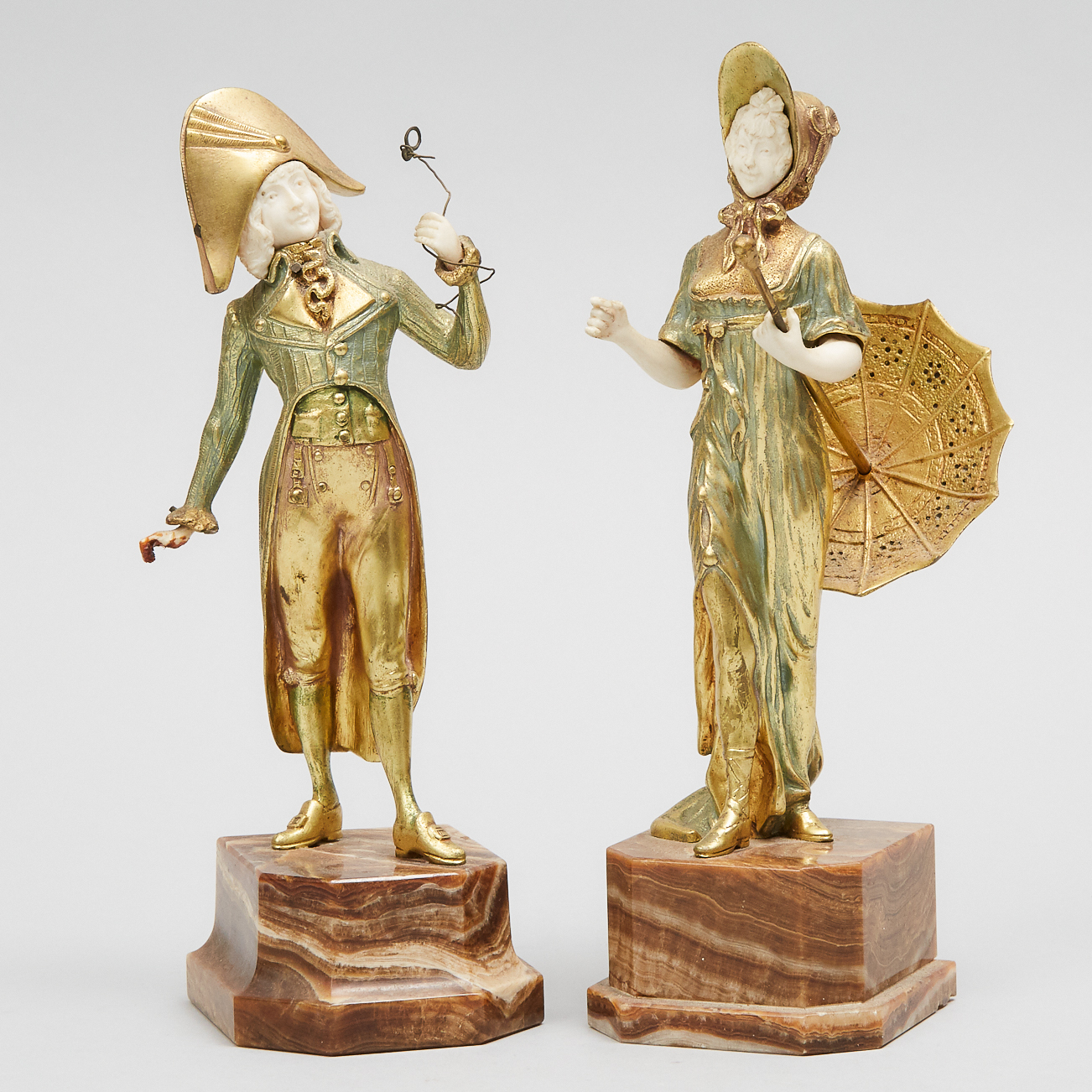 Pair of French Gilt Bronze and Ivory Fashion Figures, early 20th century