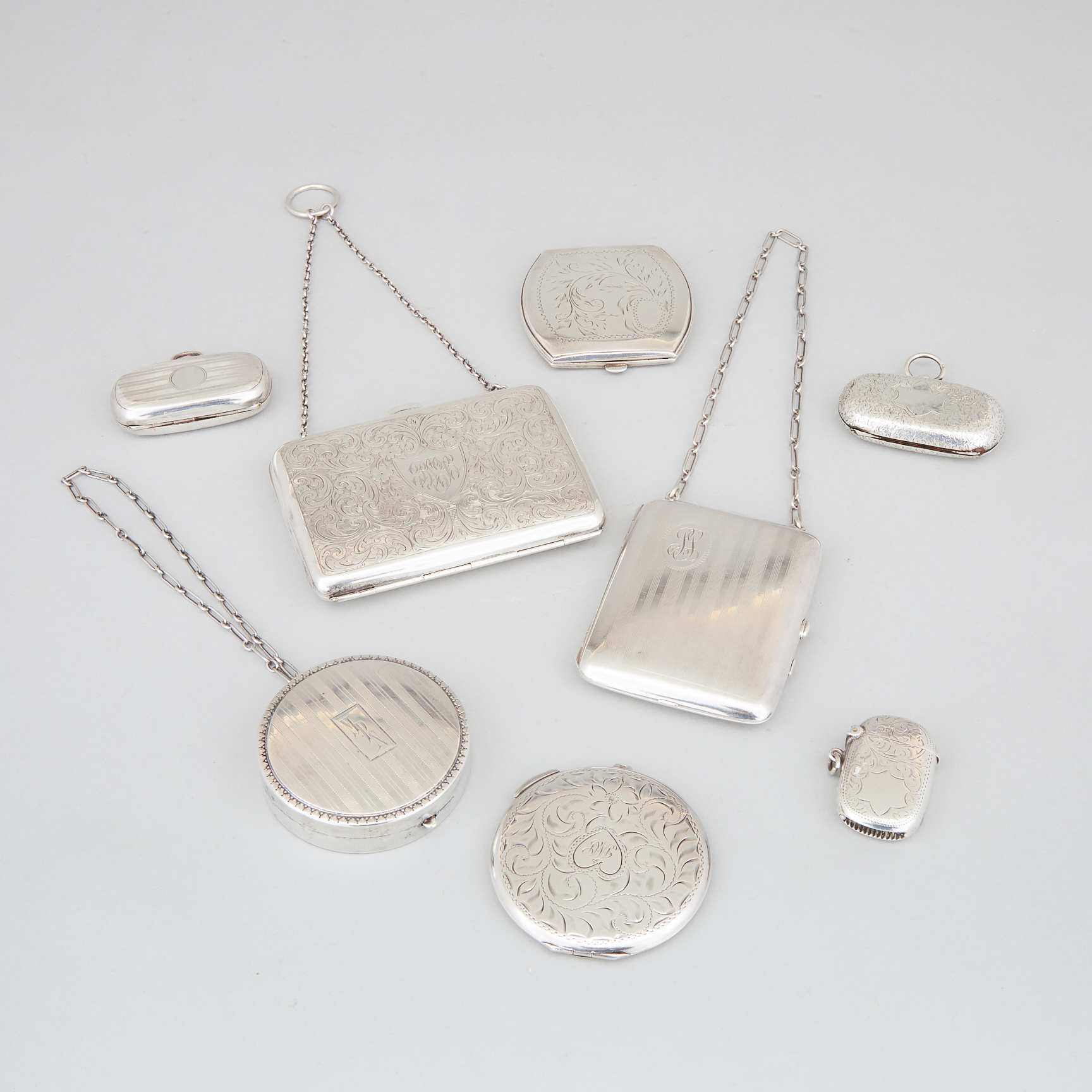 Eight English and North American Silver Compacts, Purses, Coin and Vesta Cases, 20th century