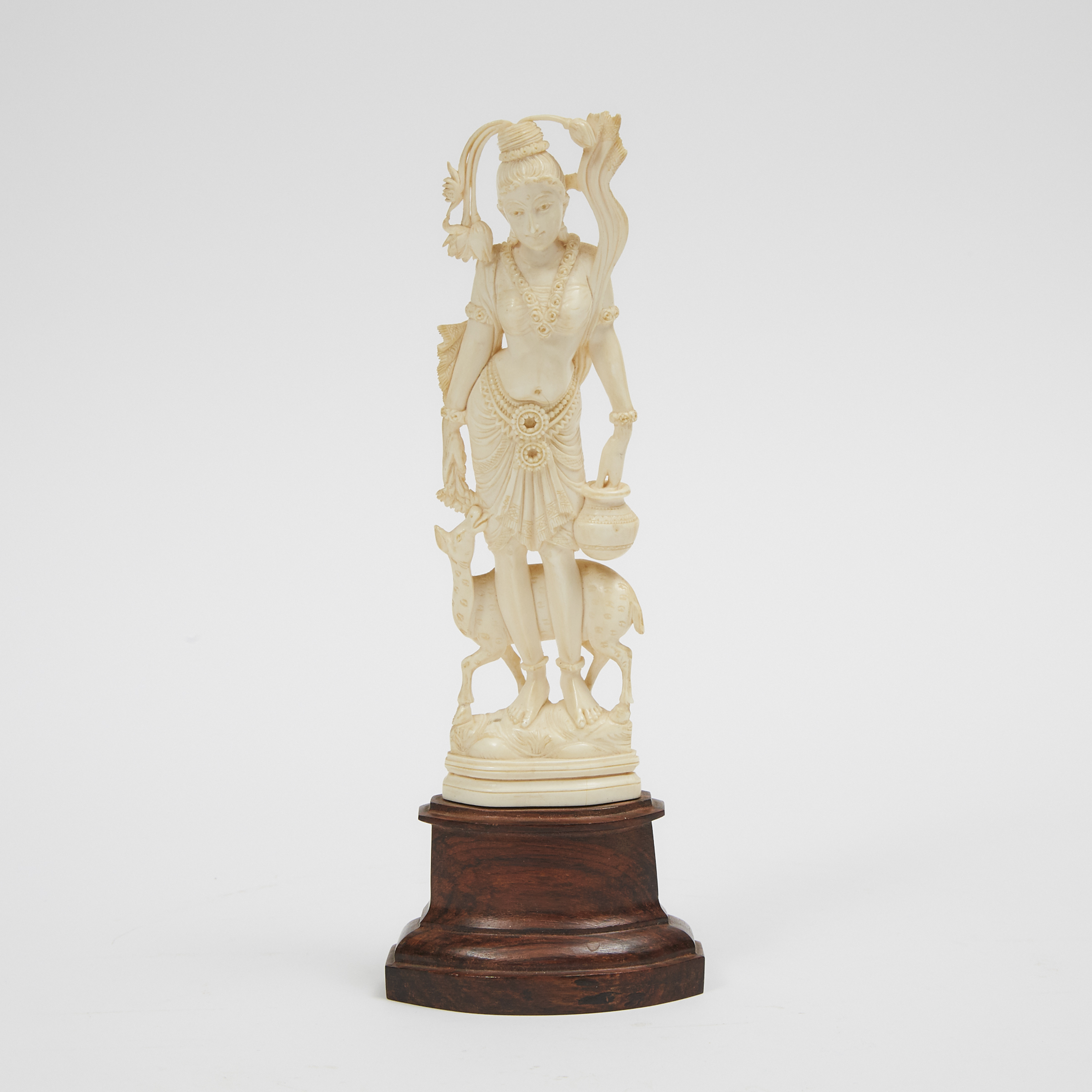 A Finely Carved Ivory Figure of Hindu Goddess with Deer