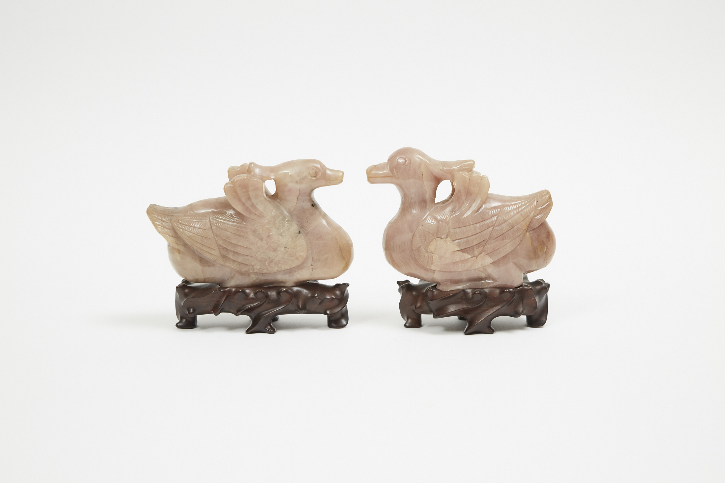 A Pair of Opaque Rose Crystal Carved Mandarin Ducks