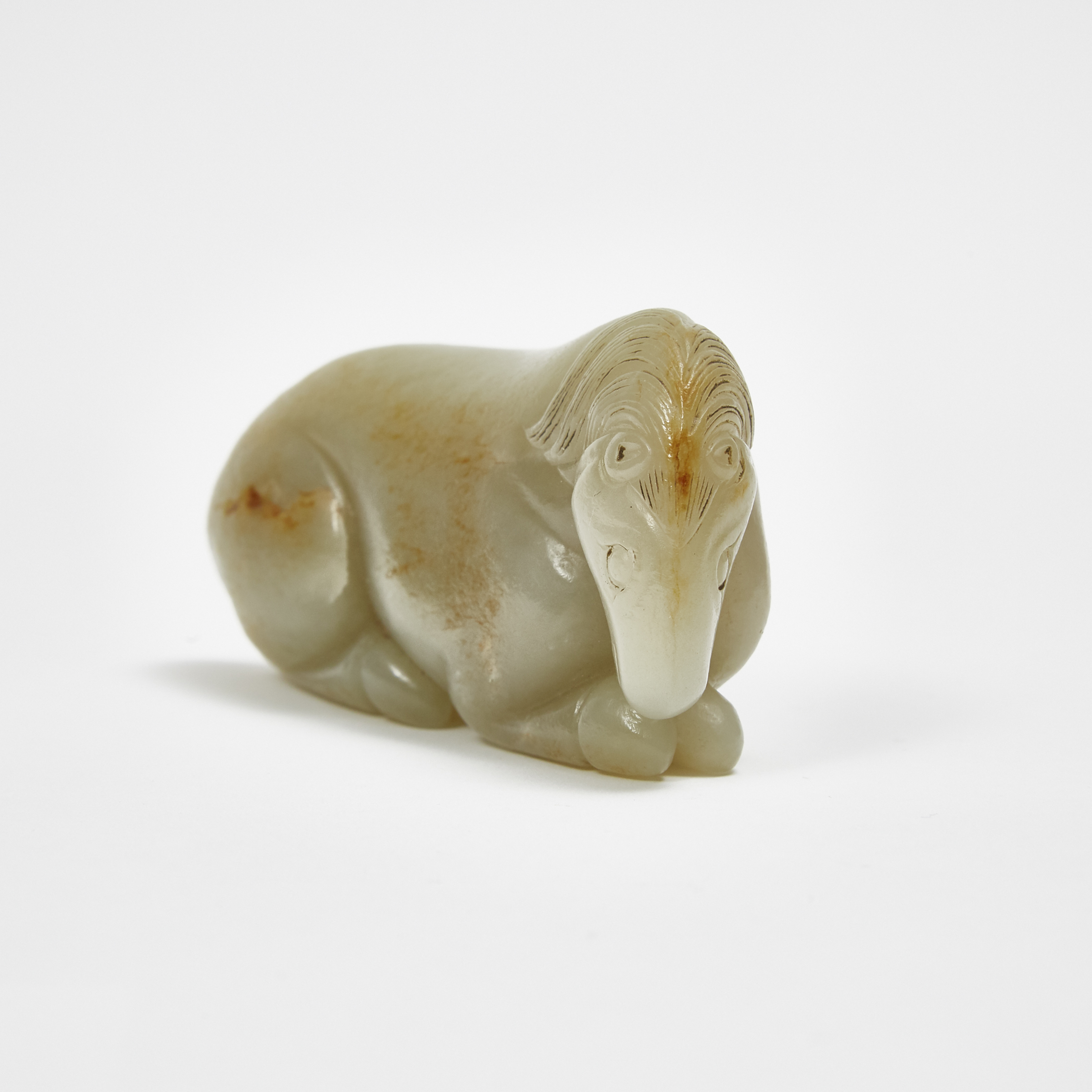 A Greyish-White and Russet Jade Carving of a Horse