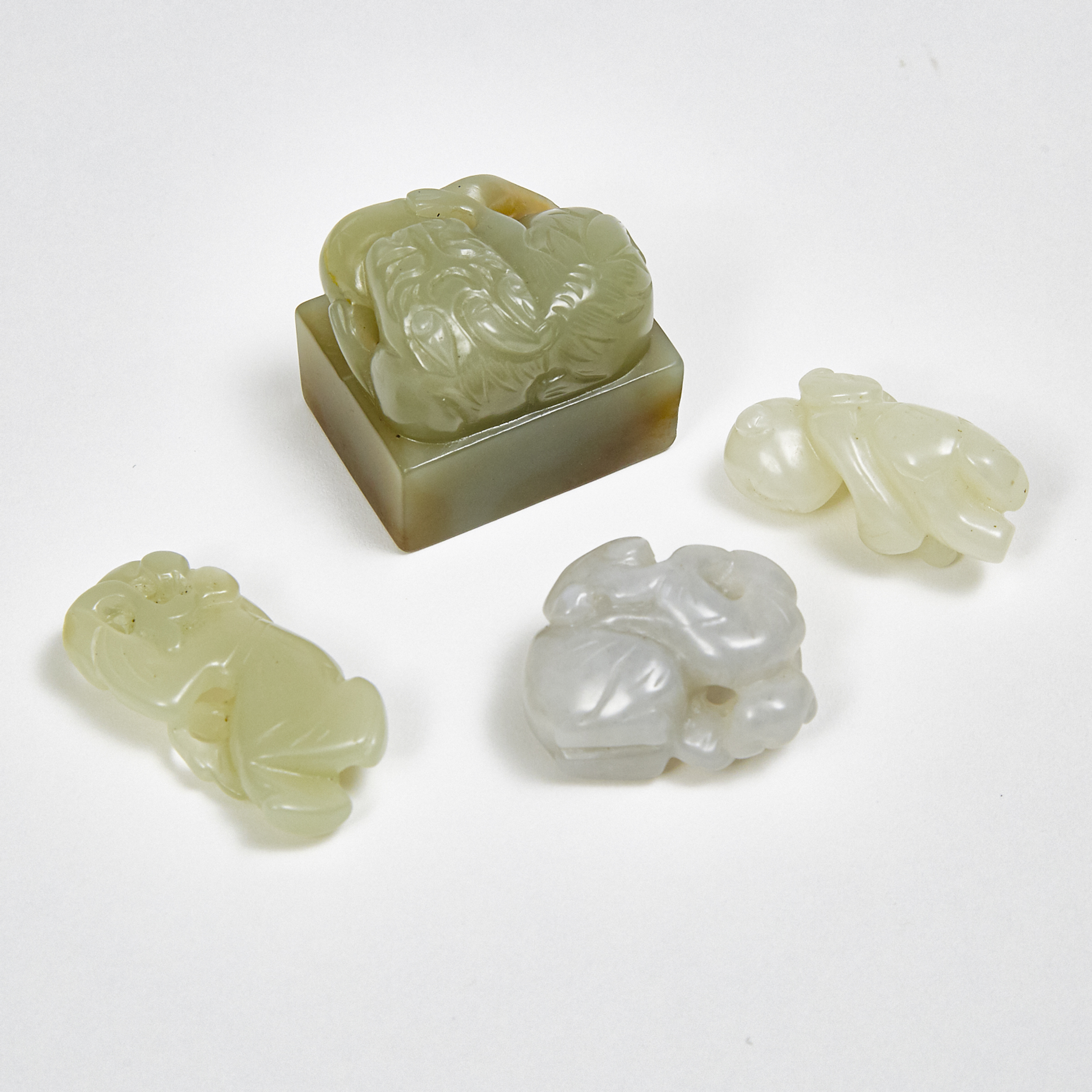 A Group of Three Jade Carved Boys, together with a 'Beast' Square Seal