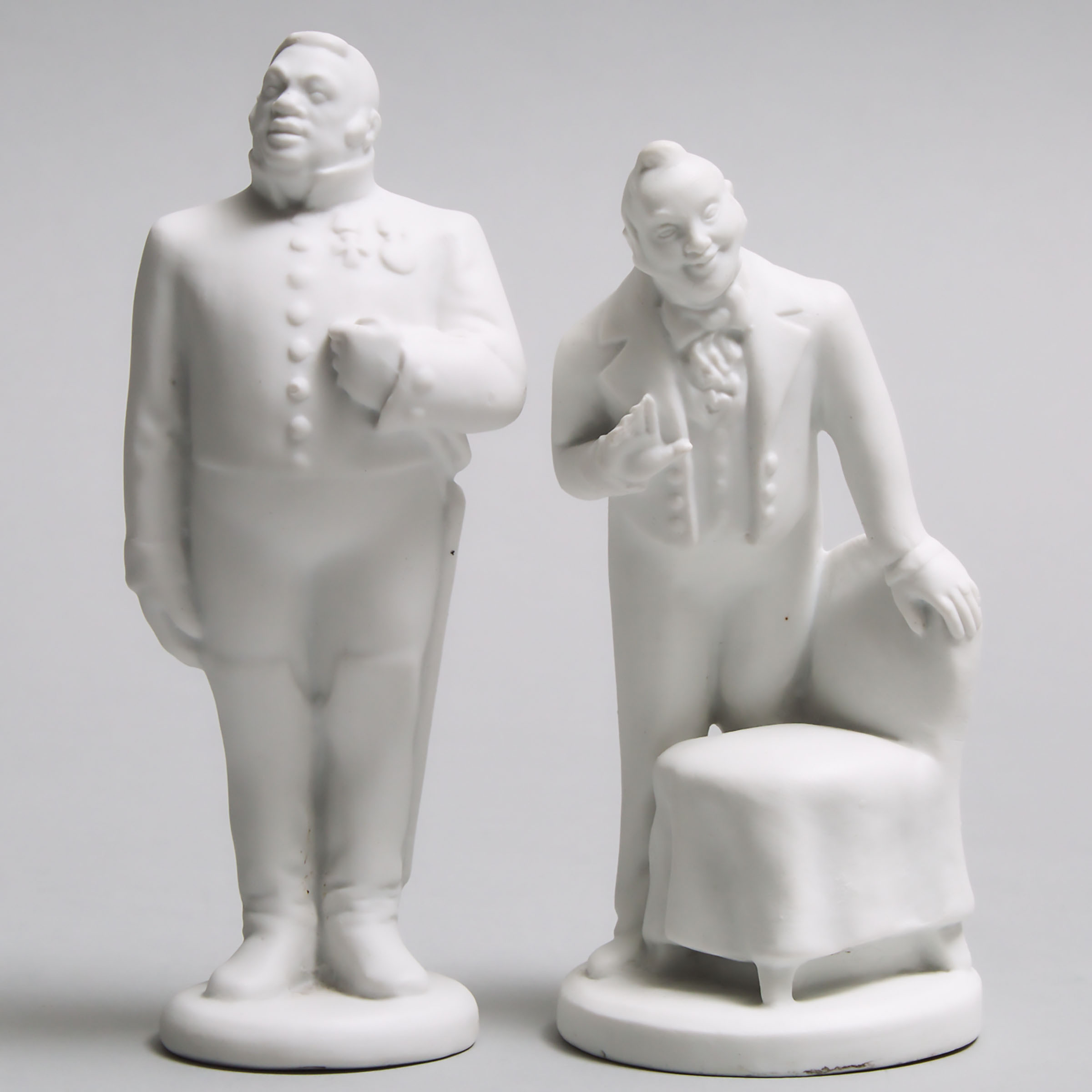 Two Russian Parian Porcelain Character Figures, from Gogol's 'Dead Souls', early 20th century