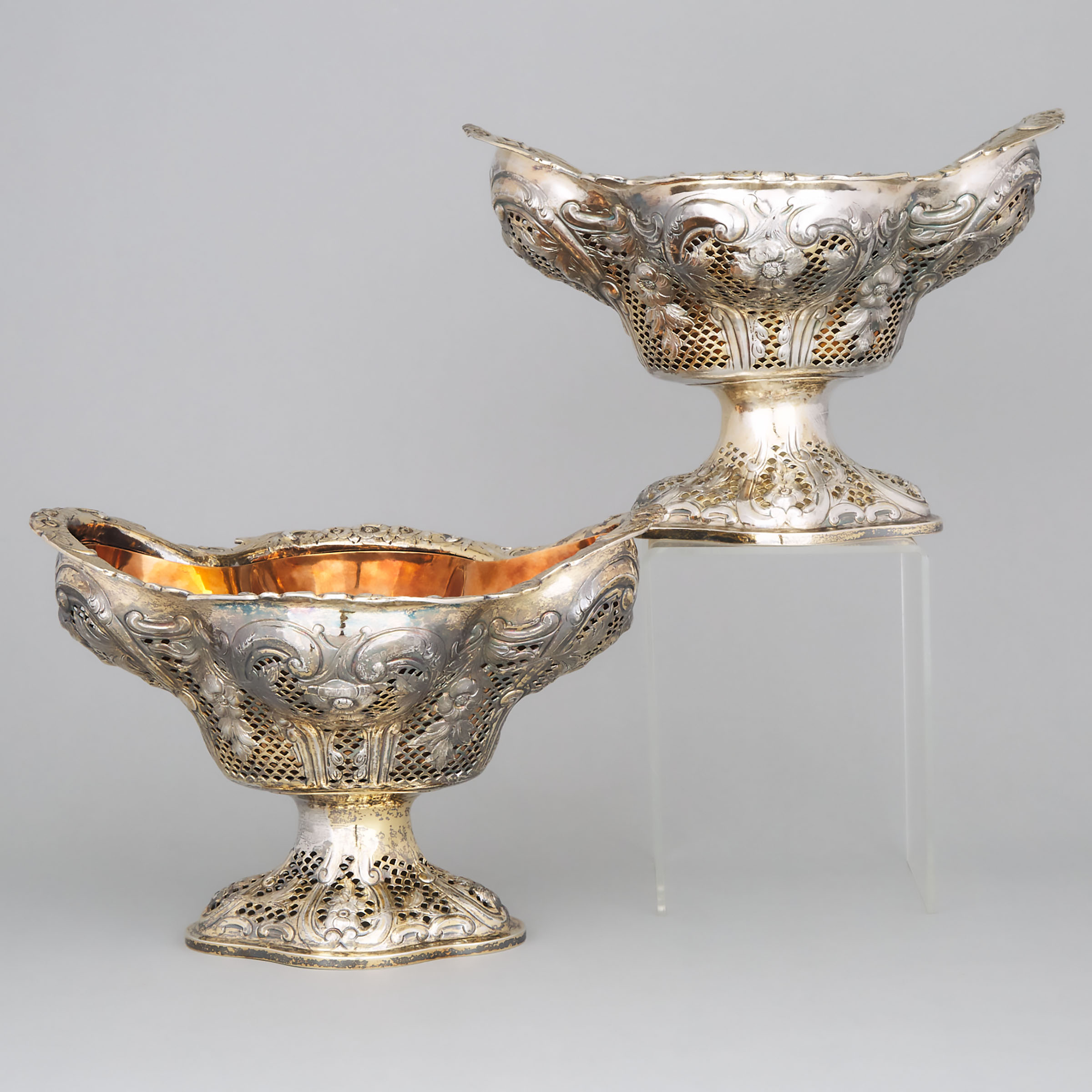 Pair of Continental Silver Parcel-Gilt Repoussé and Pierced Large Footed Comports, 20th century