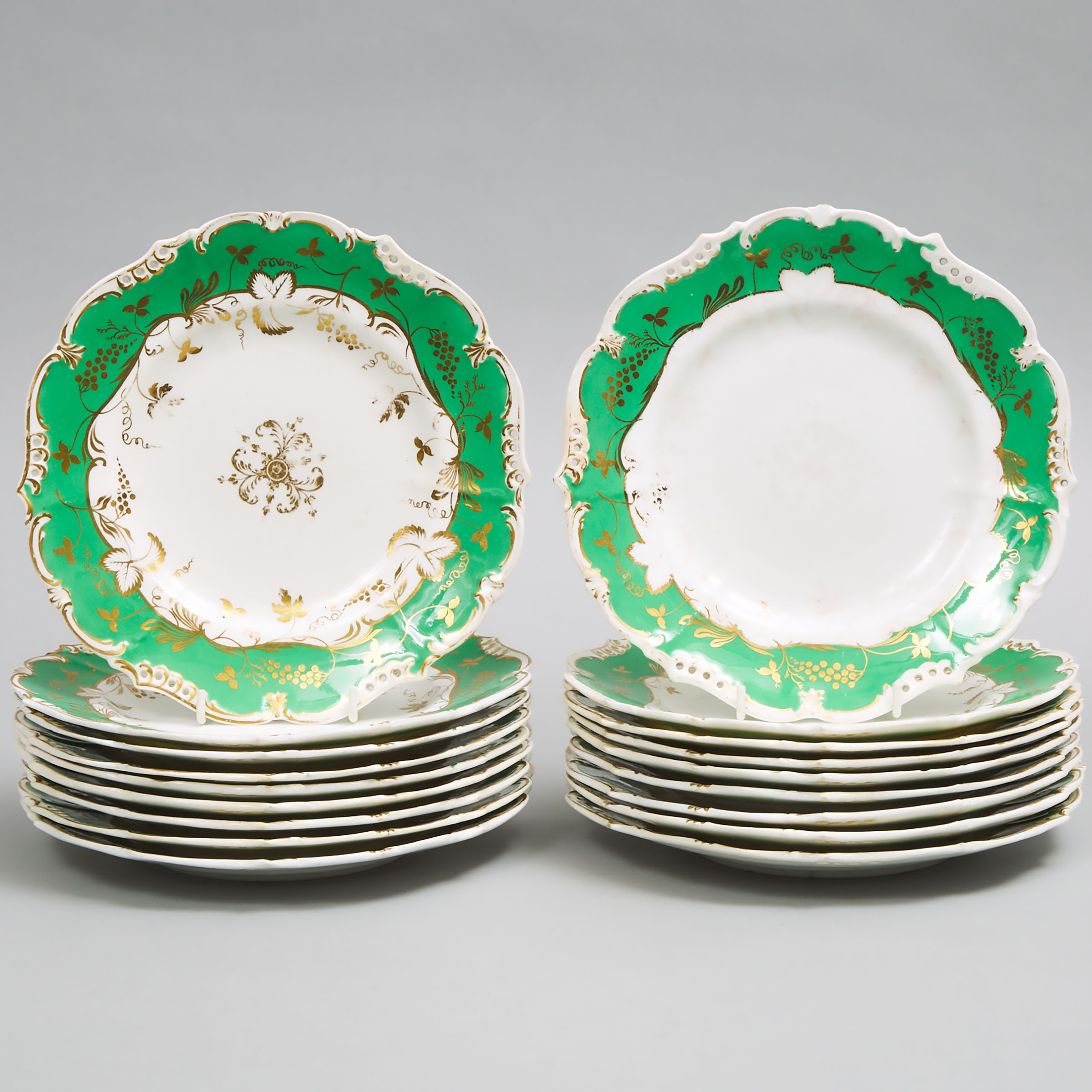 Eighteen English Porcelain Apple Green and Gilt Banded Plates, mid-19th century 