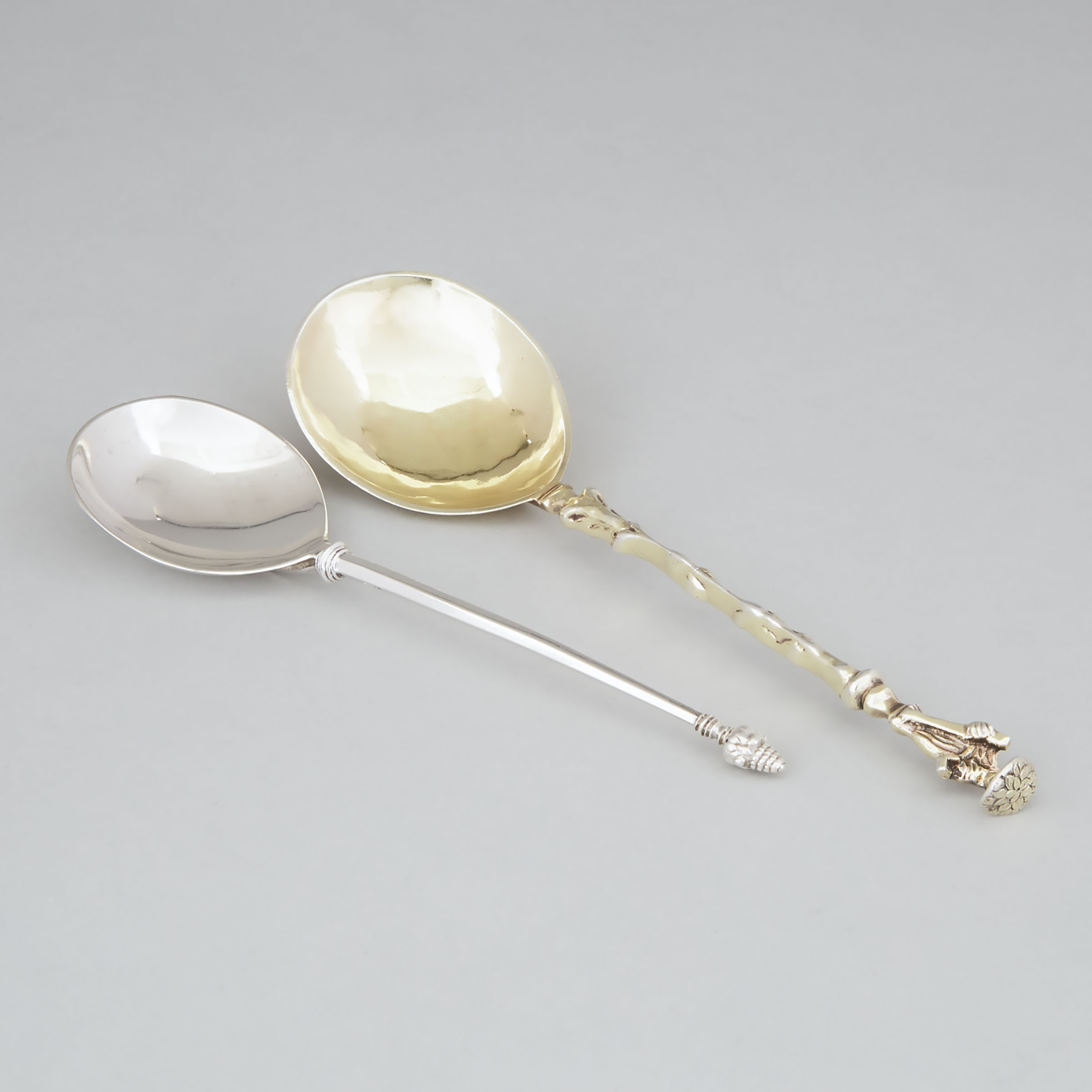 Continental Silver-Gilt Apostle Spoon and Another Spoon with Bud Finial, 19th century