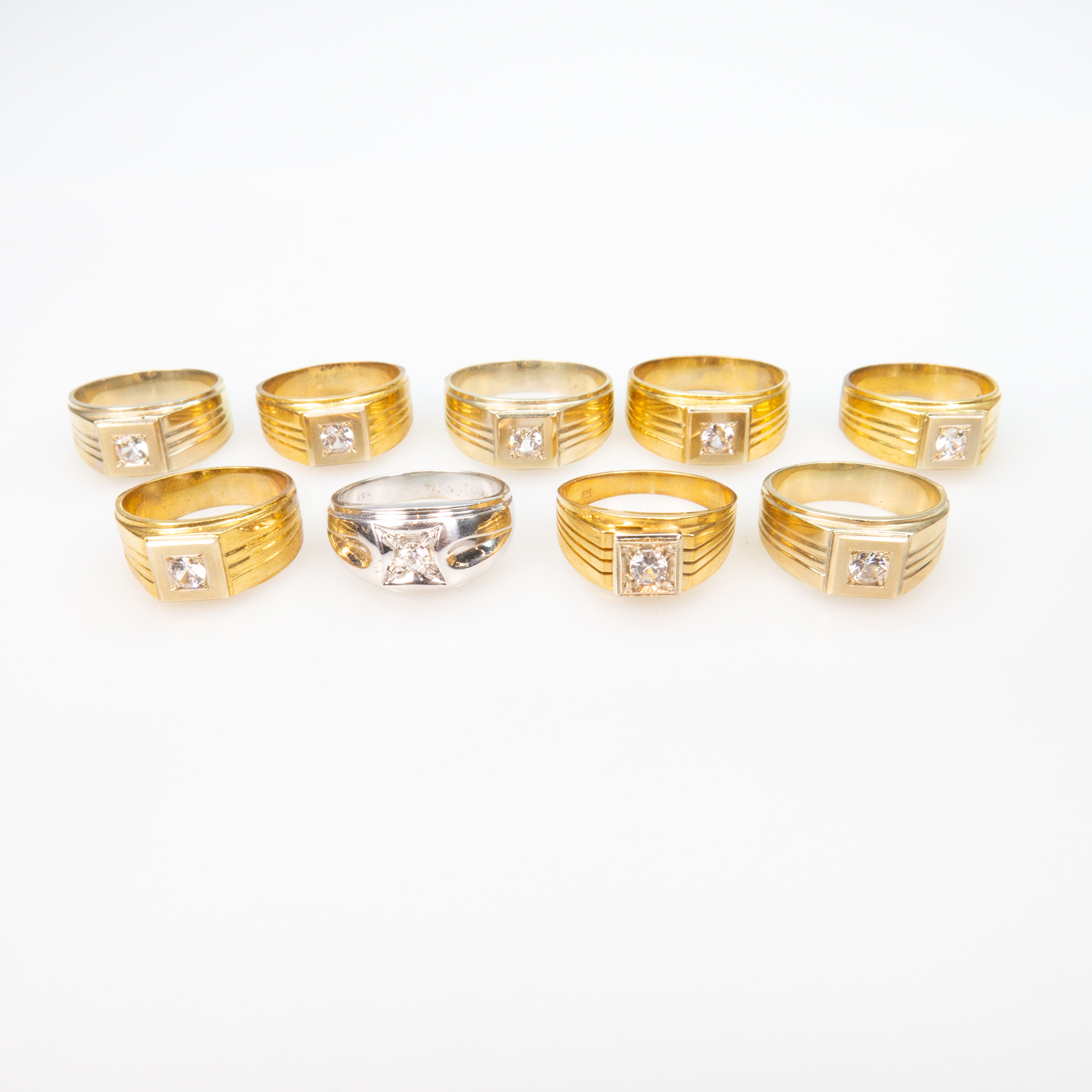1 x 14k White Gold And 8 x 18k Yellow Gold Rings