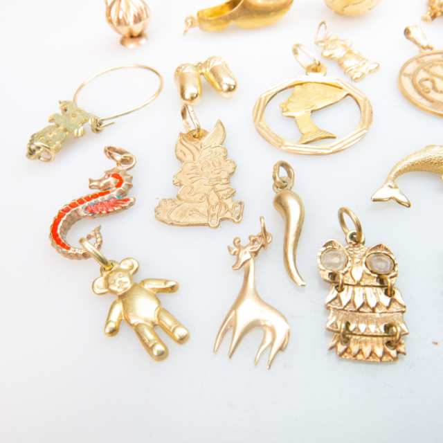 24 Various Gold Charms And Pendants