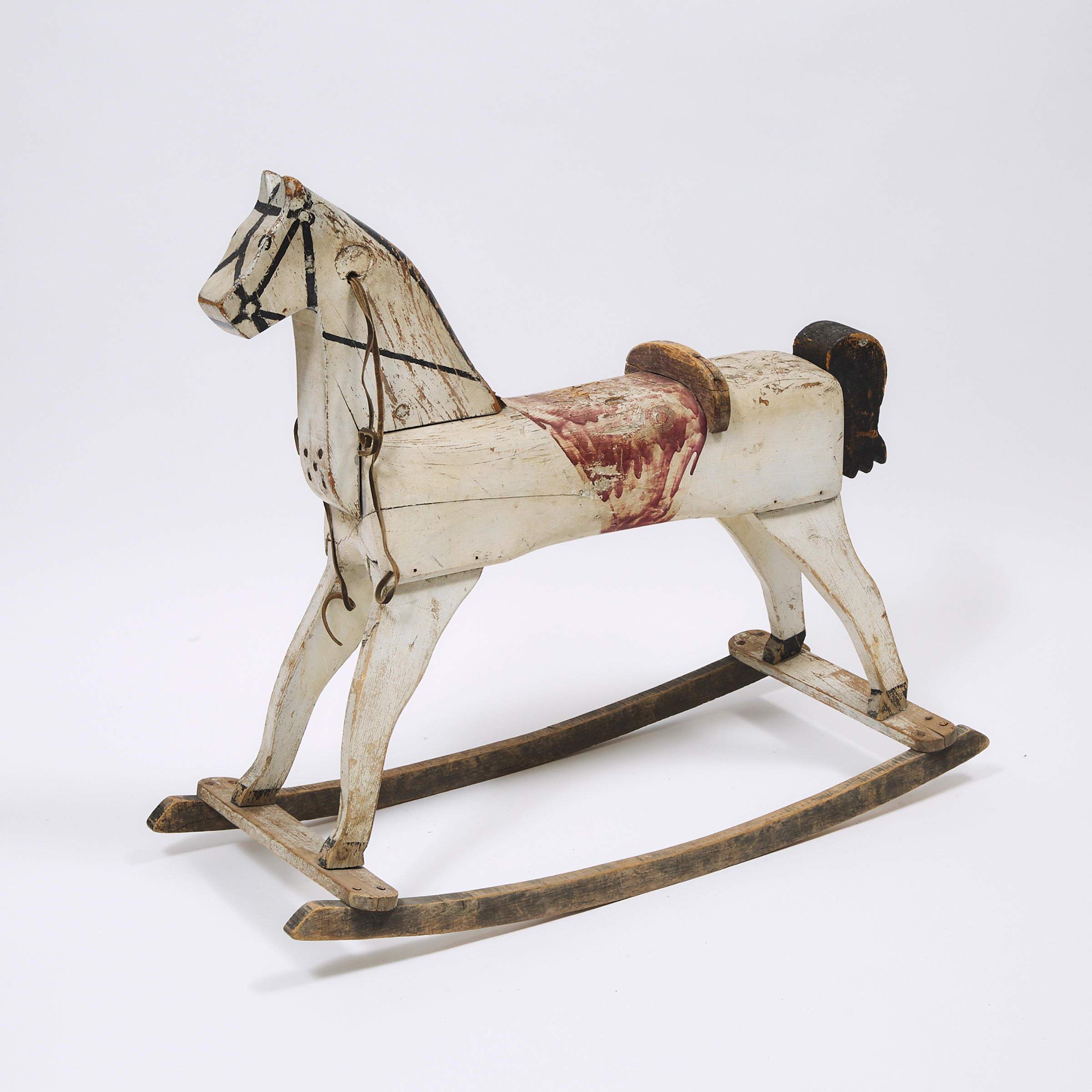 Canadian School Carved and Polychromed Wooden Rocking Horse, 20th century