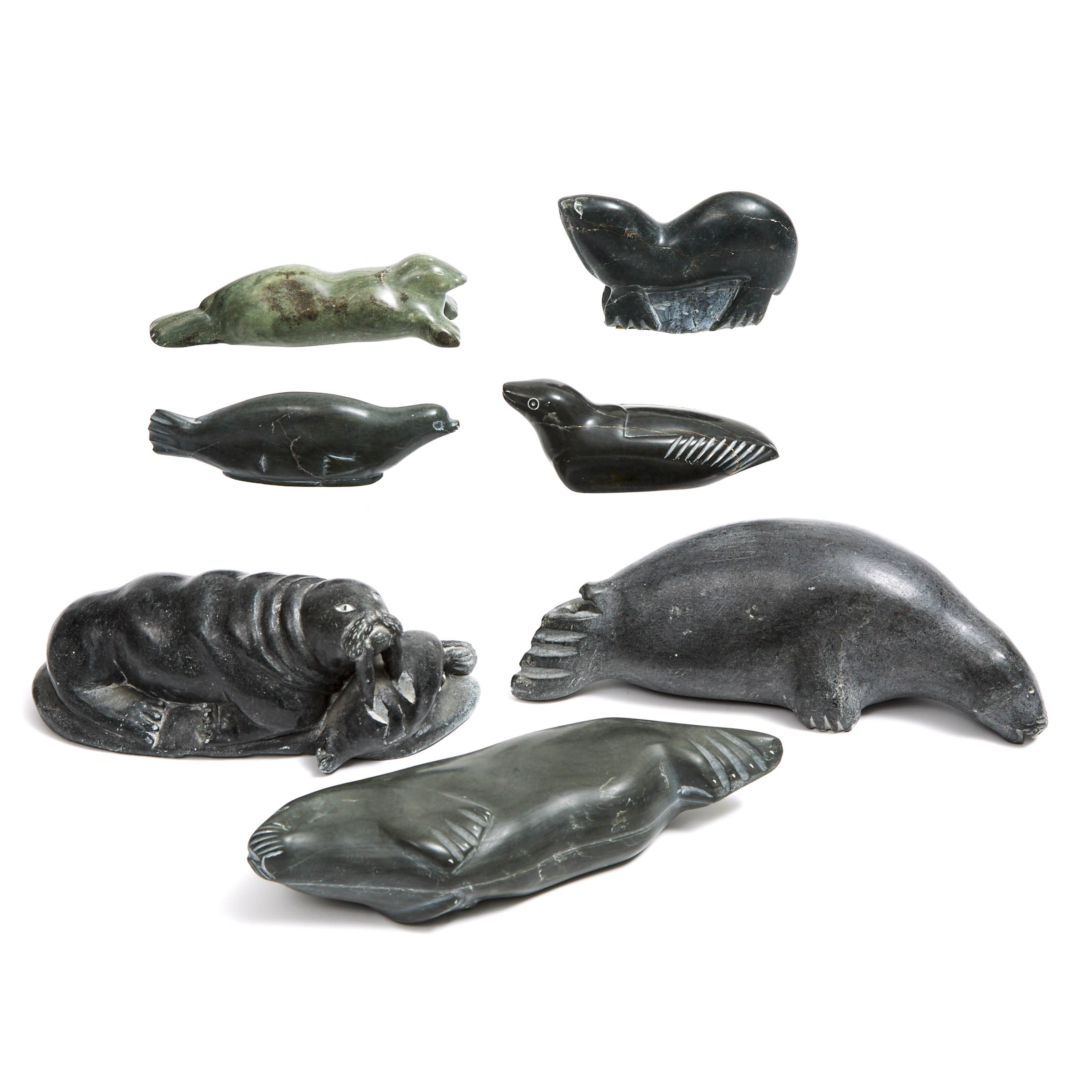 A COLLECTION OF SEVEN SEAL SCULPTURES