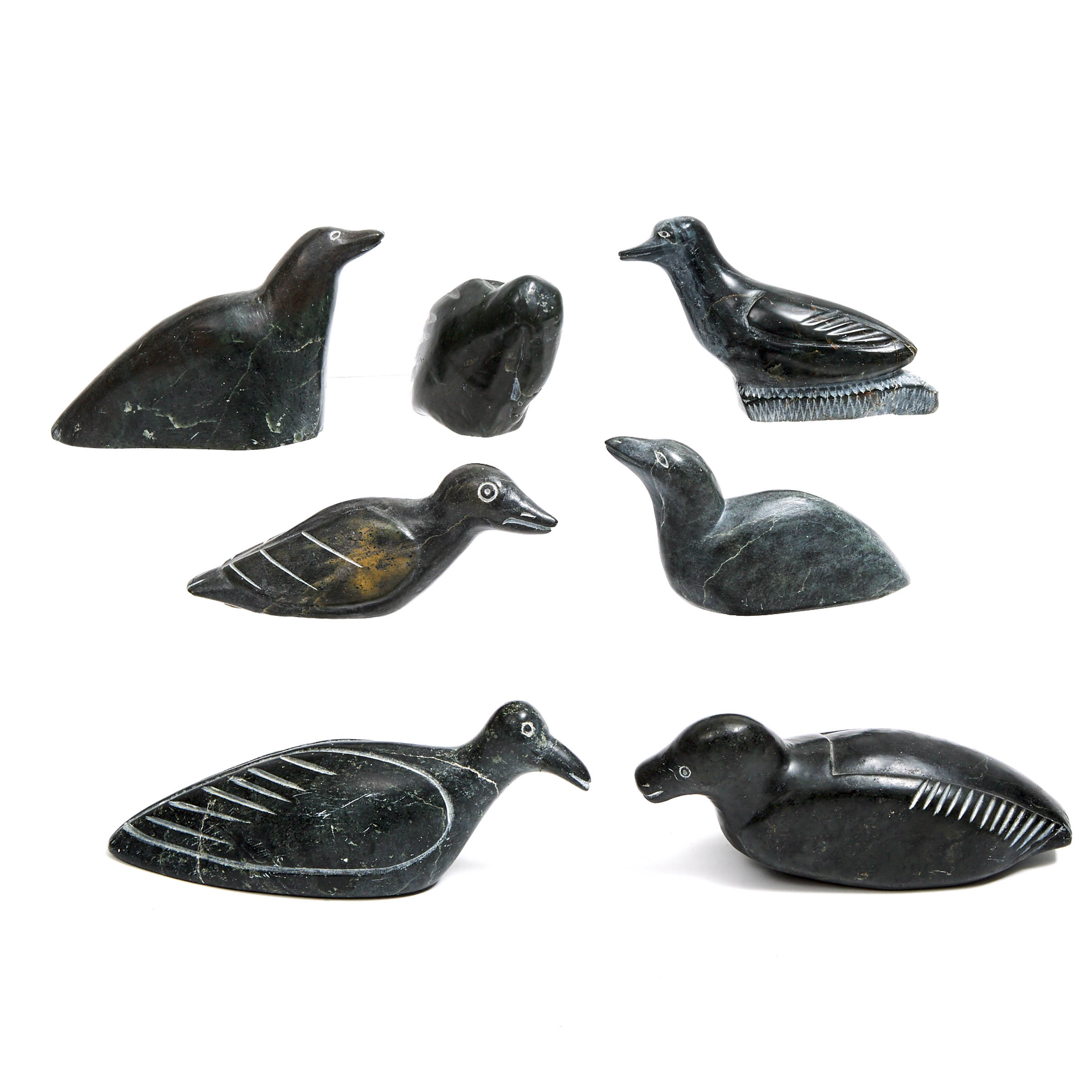 A COLLECTION OF SEVEN ARCTIC BIRD CARVINGS