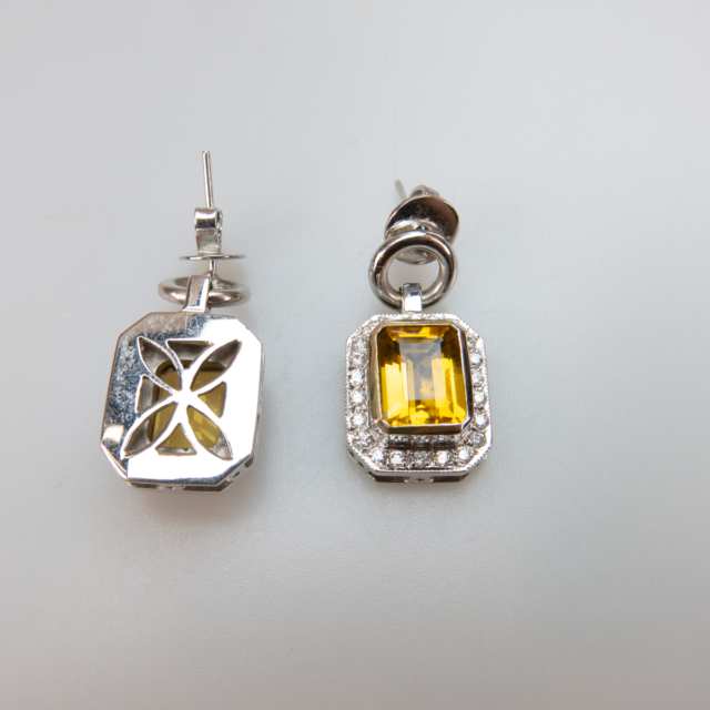 Pair Of 18k White Gold Earrings And A Pendant